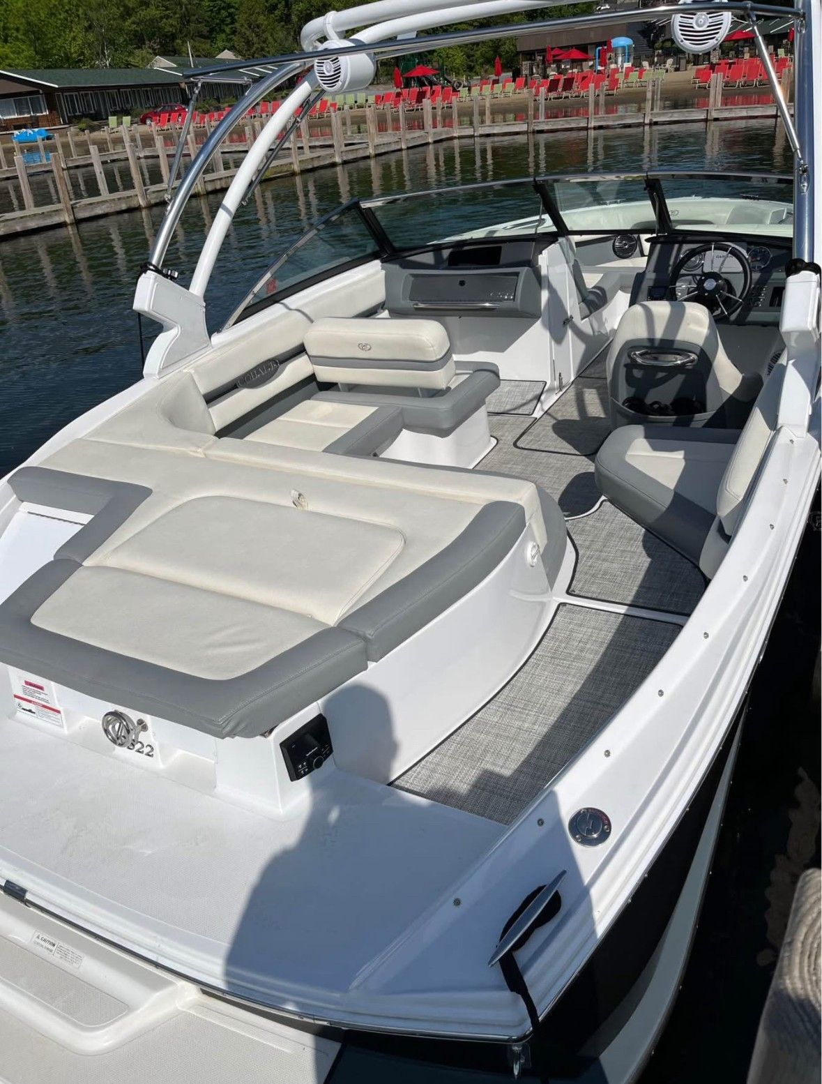 2019 Cobalt CS22 with stylish open cockpit and comfortable seating at the dock.