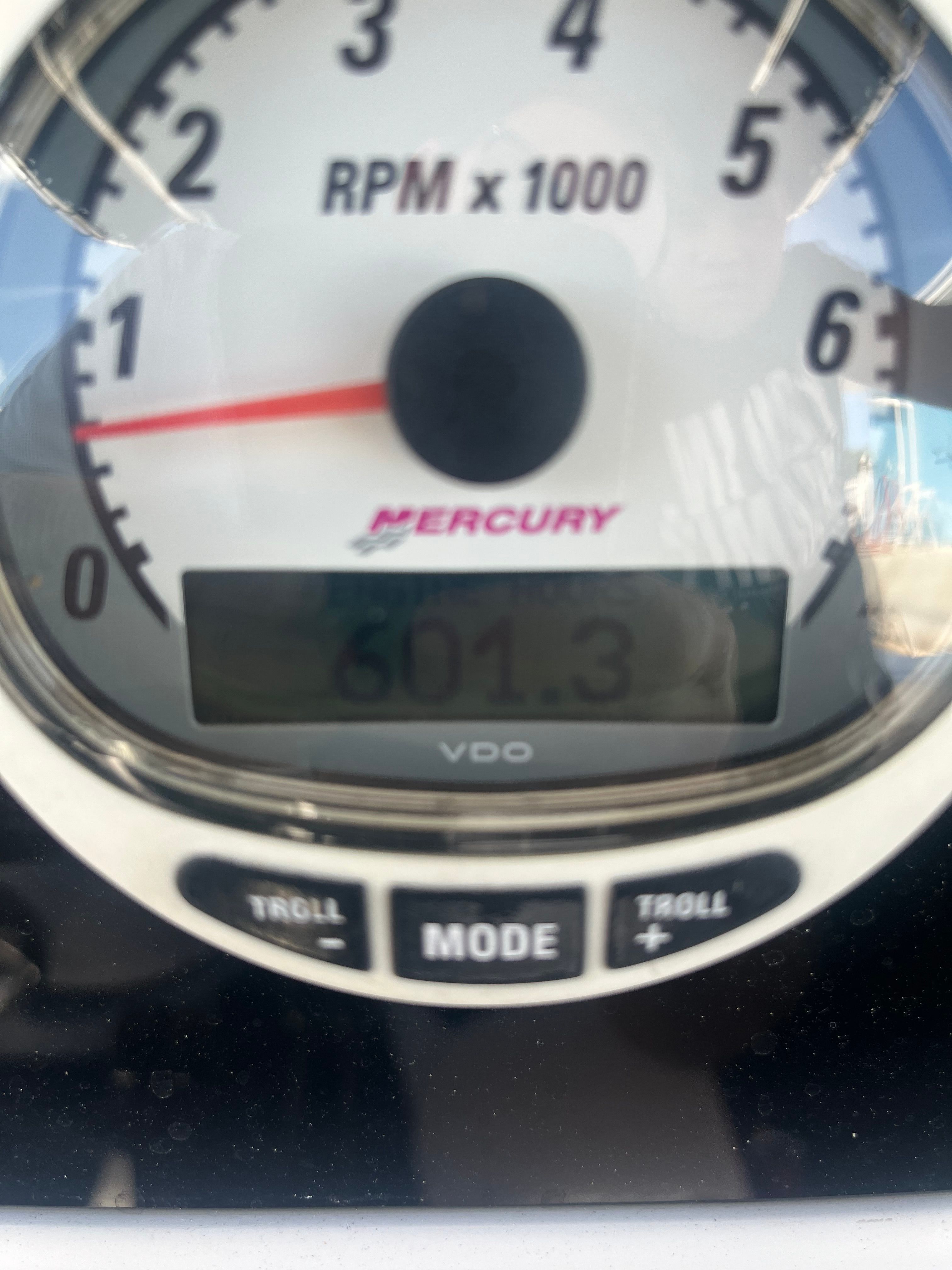 Tachometer of a Donzi 29 ZF boat, displaying 601.3 hours.