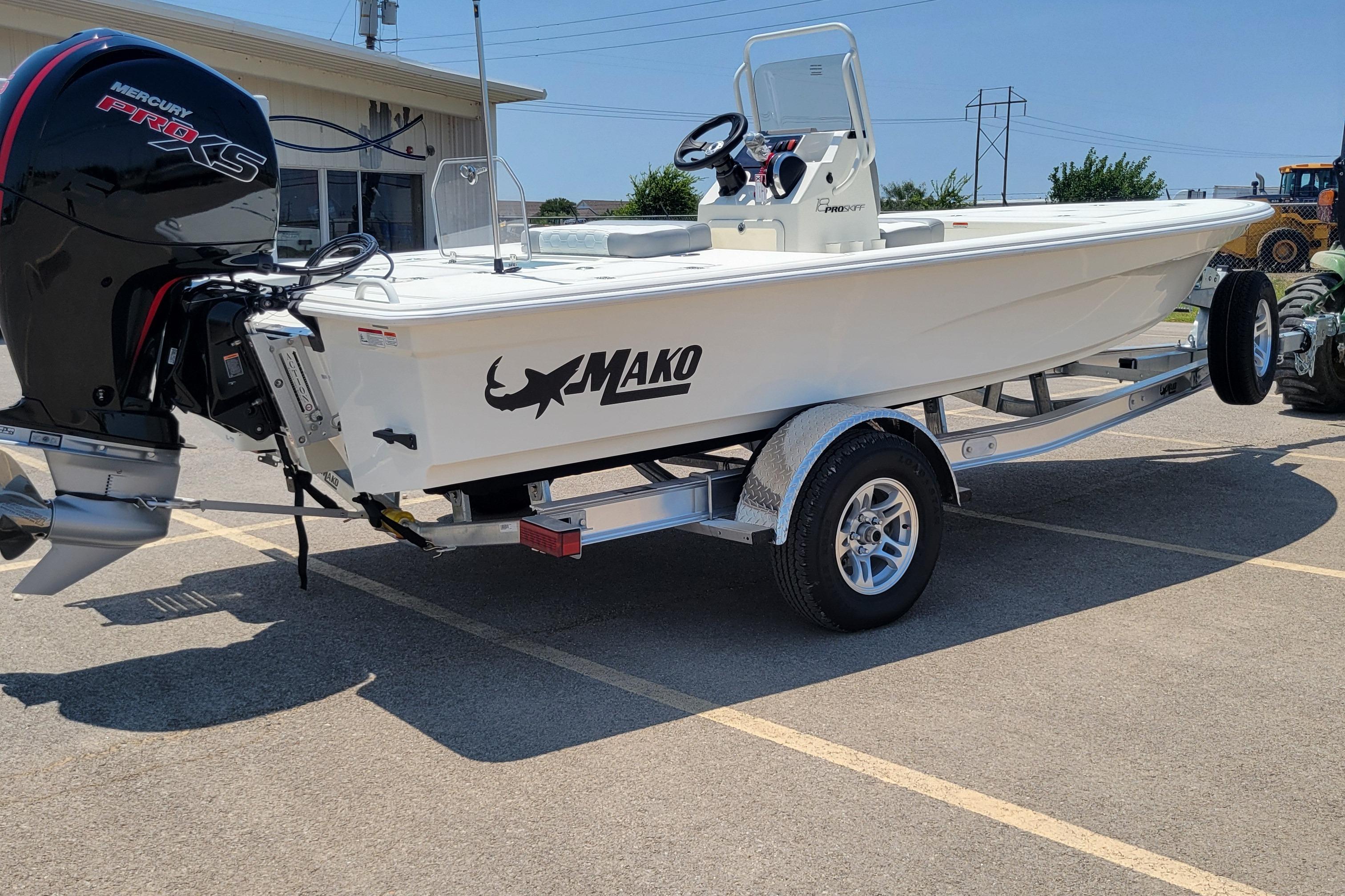 2026 Mako 18 Pro Skiff boat on trailer, featuring Mercury Pro XS engine.