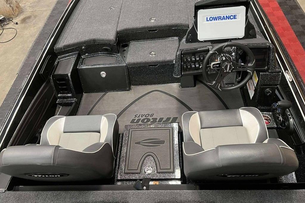 2026 Triton 20XP Patriot boat interior with Lowrance system and dual seats.