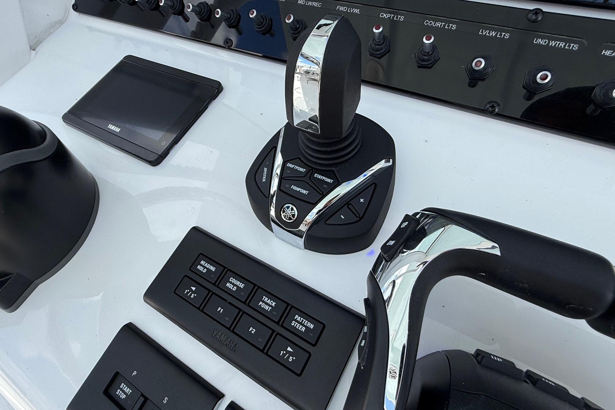 Control panel of 2026 Sea Hunt Ultra 285 Coffin Box with Yamaha joystick and switches.