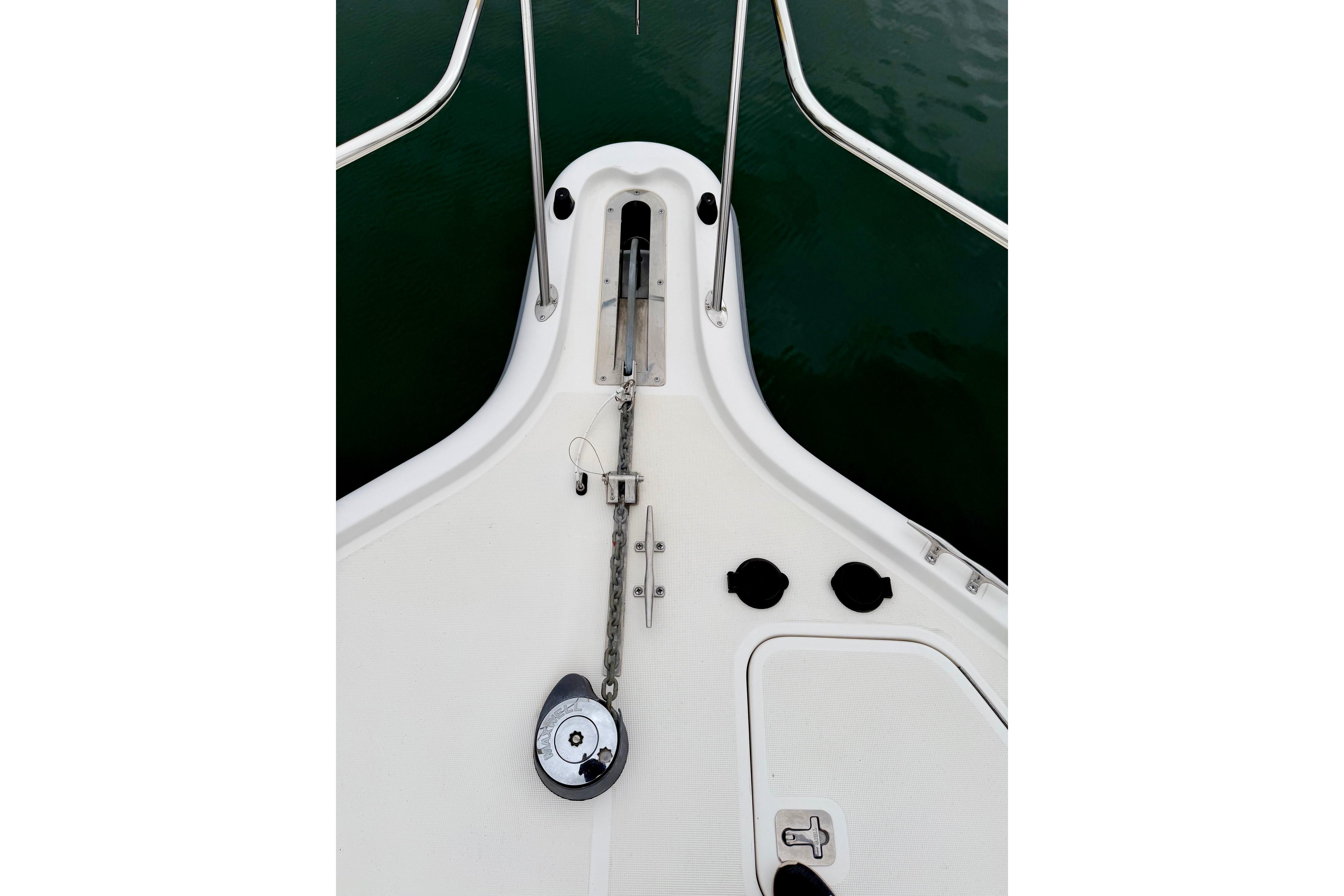 Bow view of 2003 Tiara Yachts 3500 Open, featuring anchor chain and deck fittings.