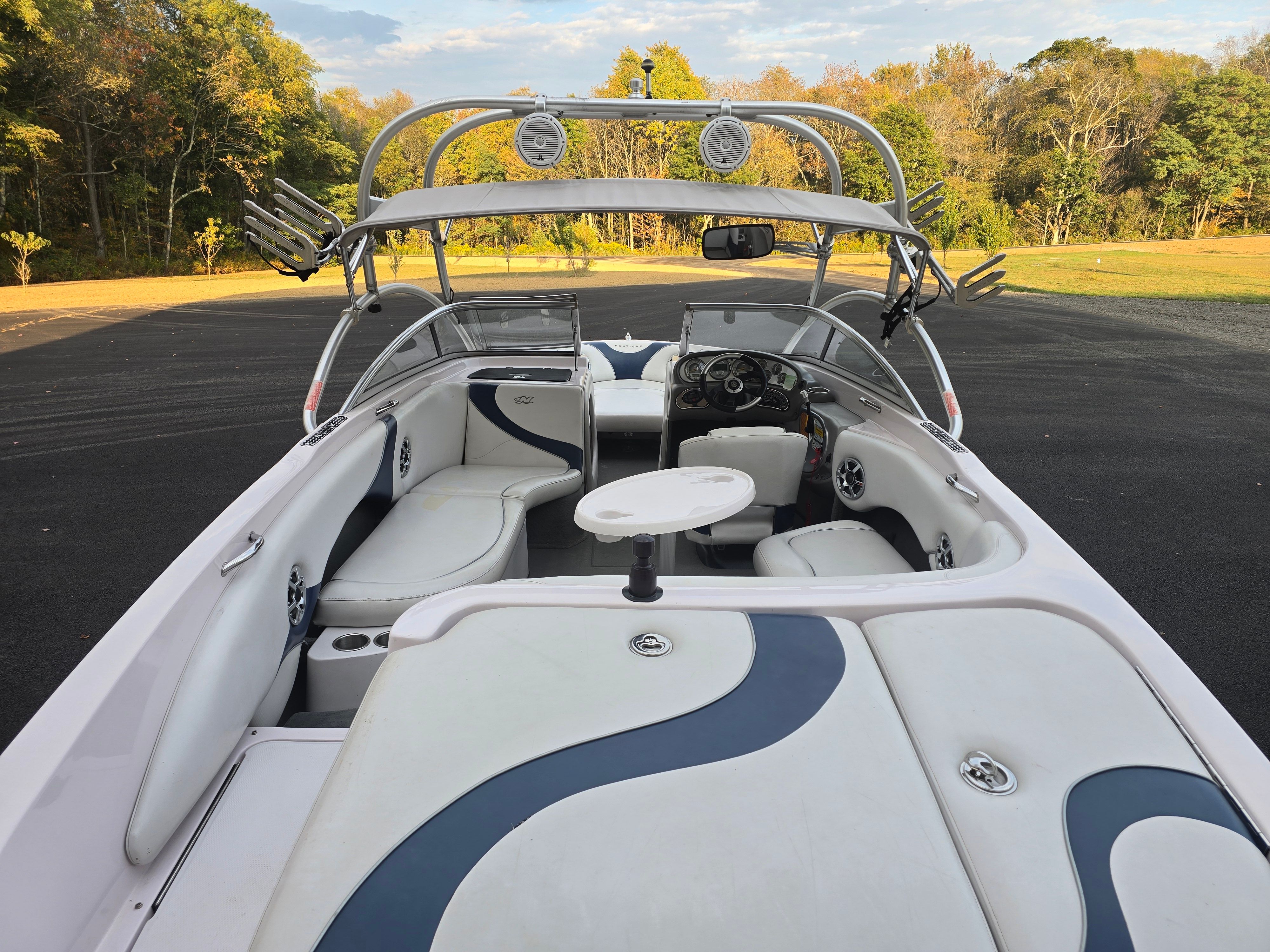 Interior view of a 2006 Correct Craft 228 boat with sleek seating.