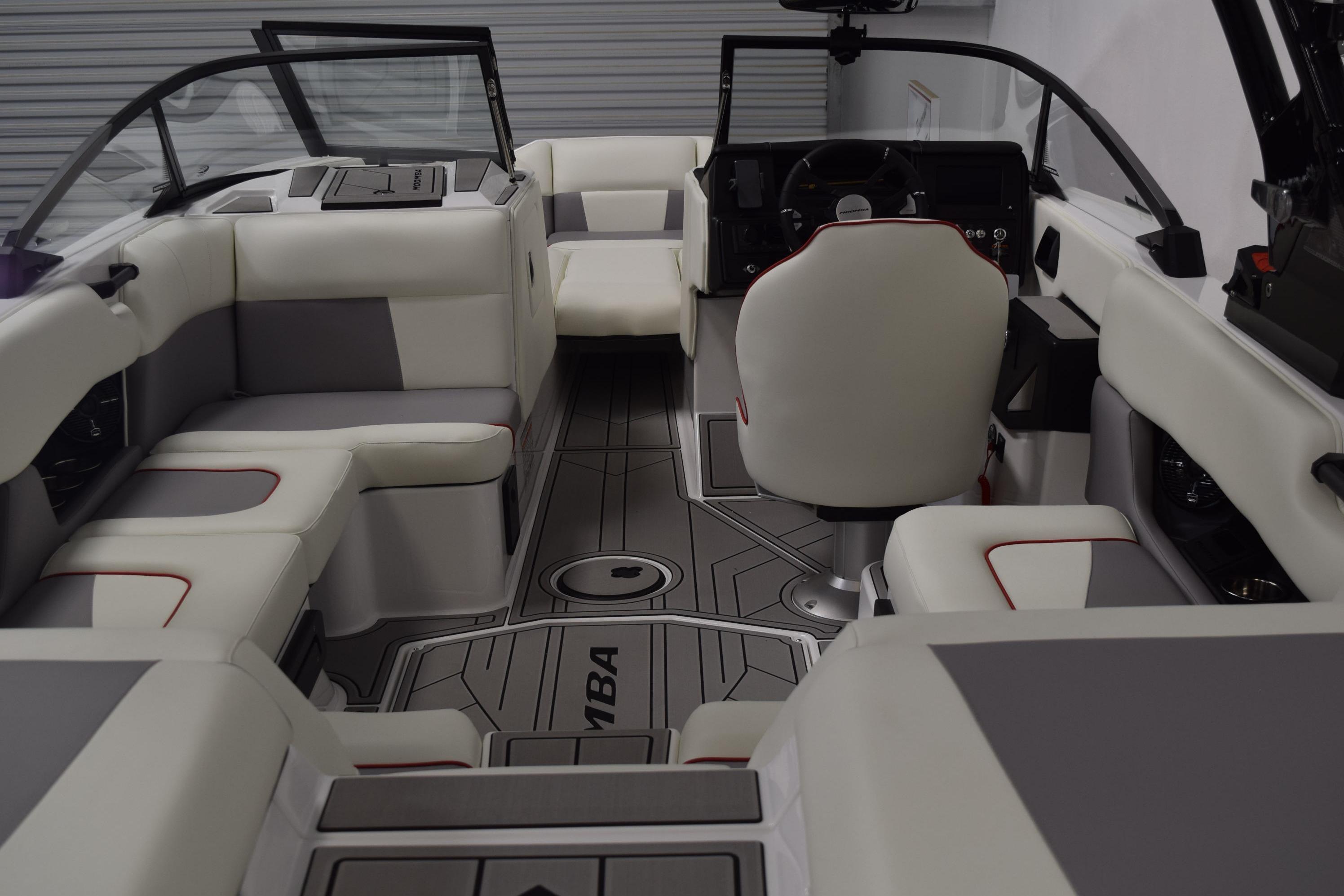 2026 Moomba Craz boat interior with white and gray seating, modern design.
