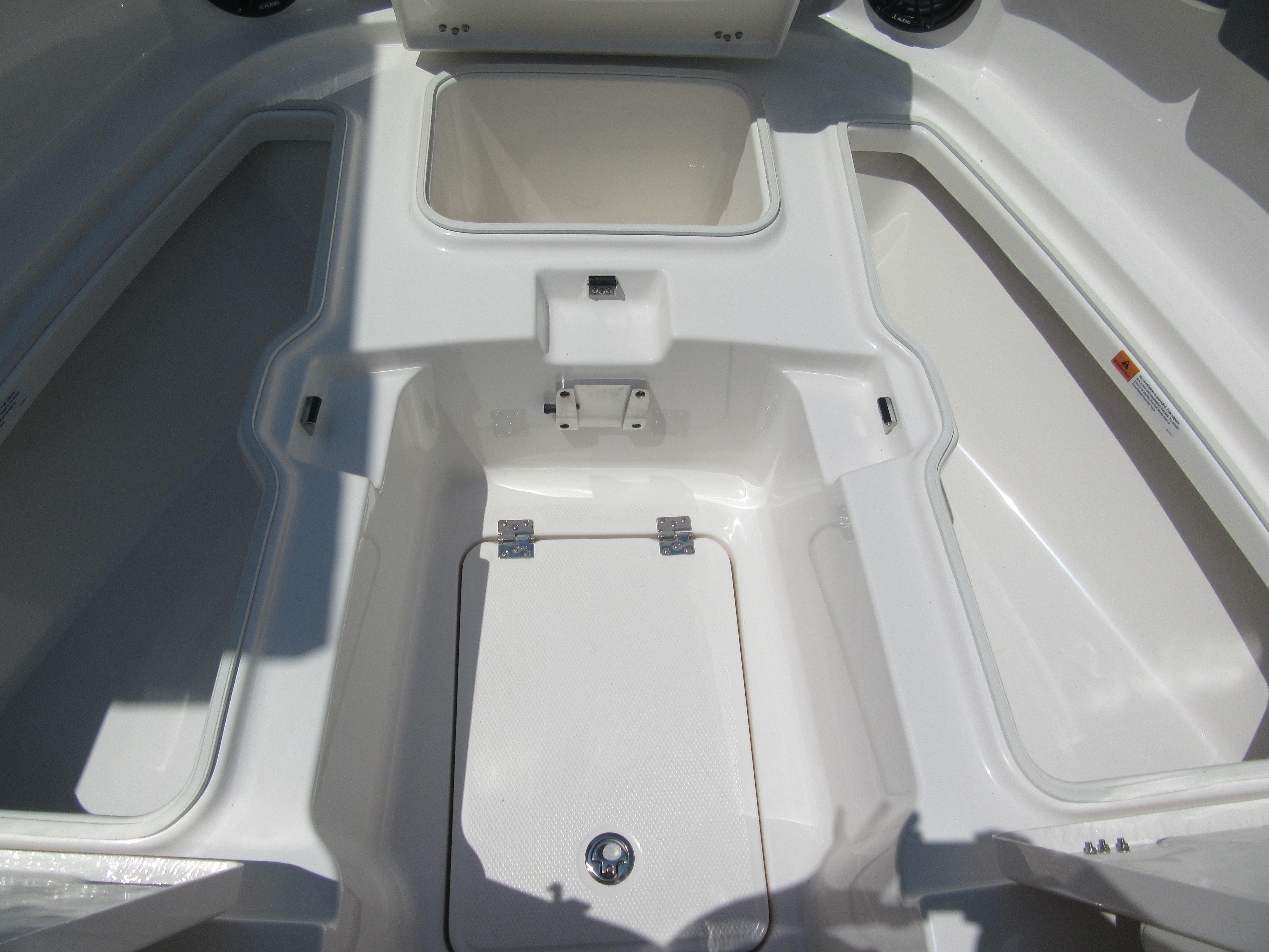 2025 Robalo R257 Dual Console boat interior storage compartments.