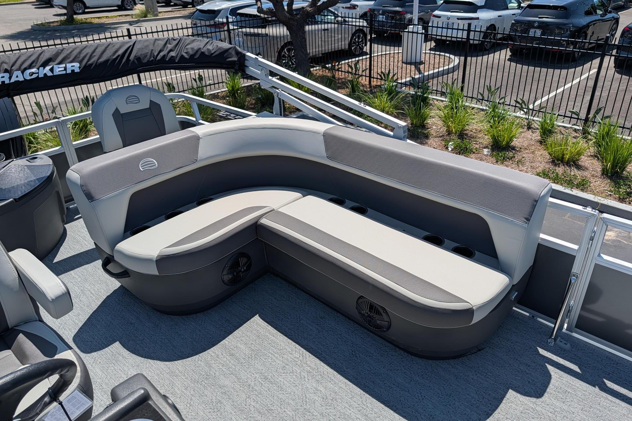 2026 Sun Tracker Bass Buggy 18 DLX pontoon boat with comfortable seating and modern design.