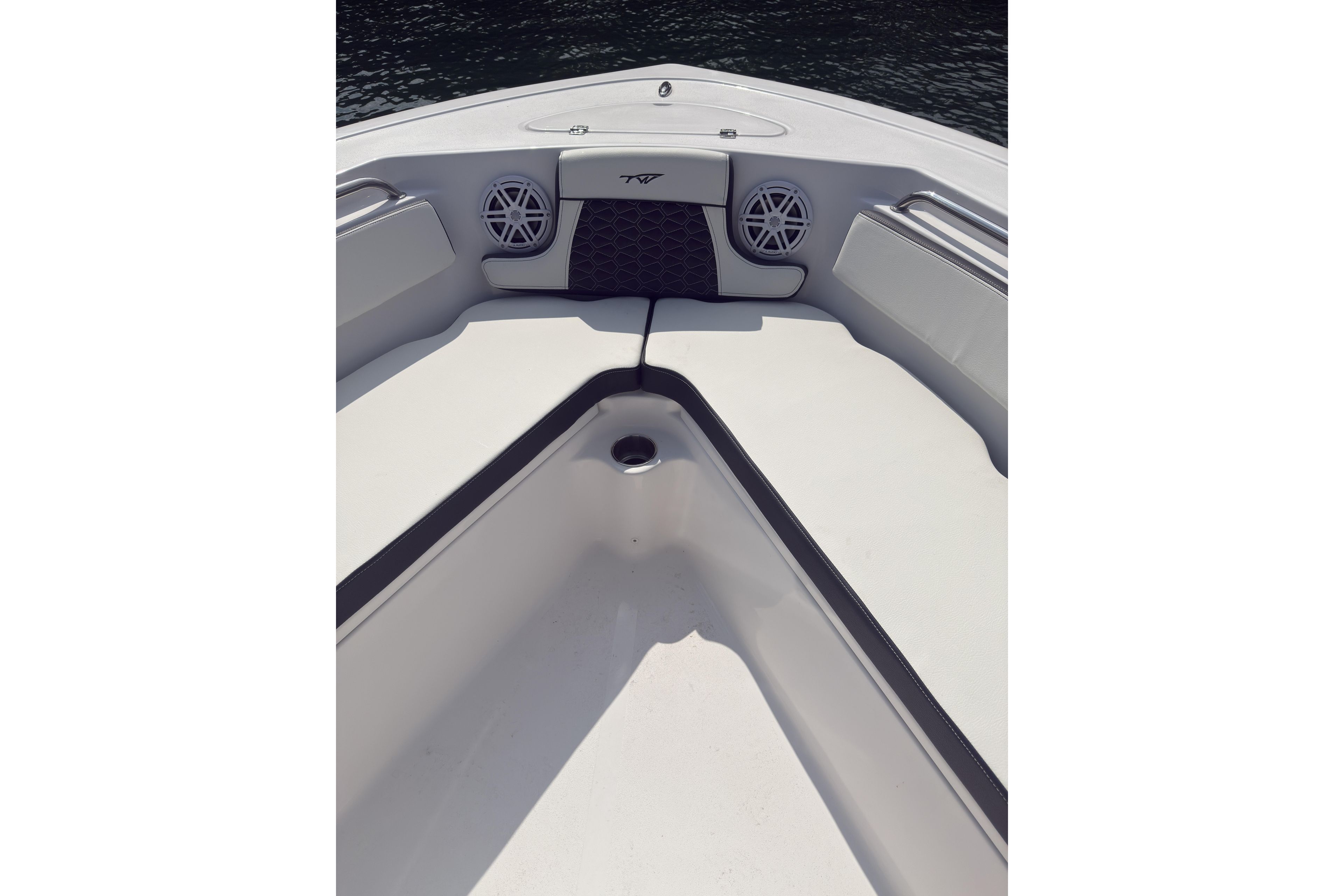2026 Tidewater 210 CC Adventure boat interior with seating and speakers.