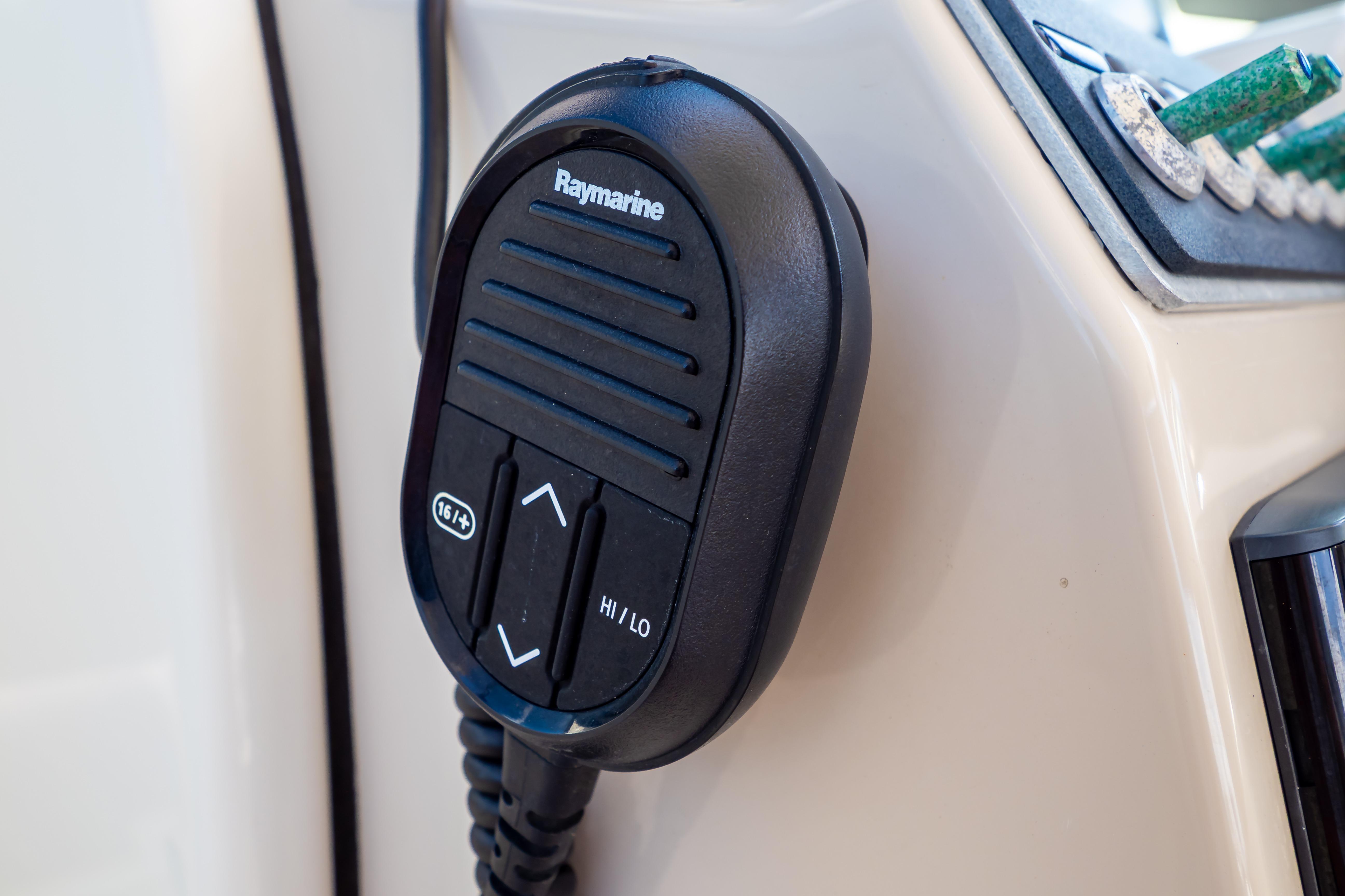 Raymarine radio microphone on 2019 Boston Whaler 270 Vantage boat dashboard.