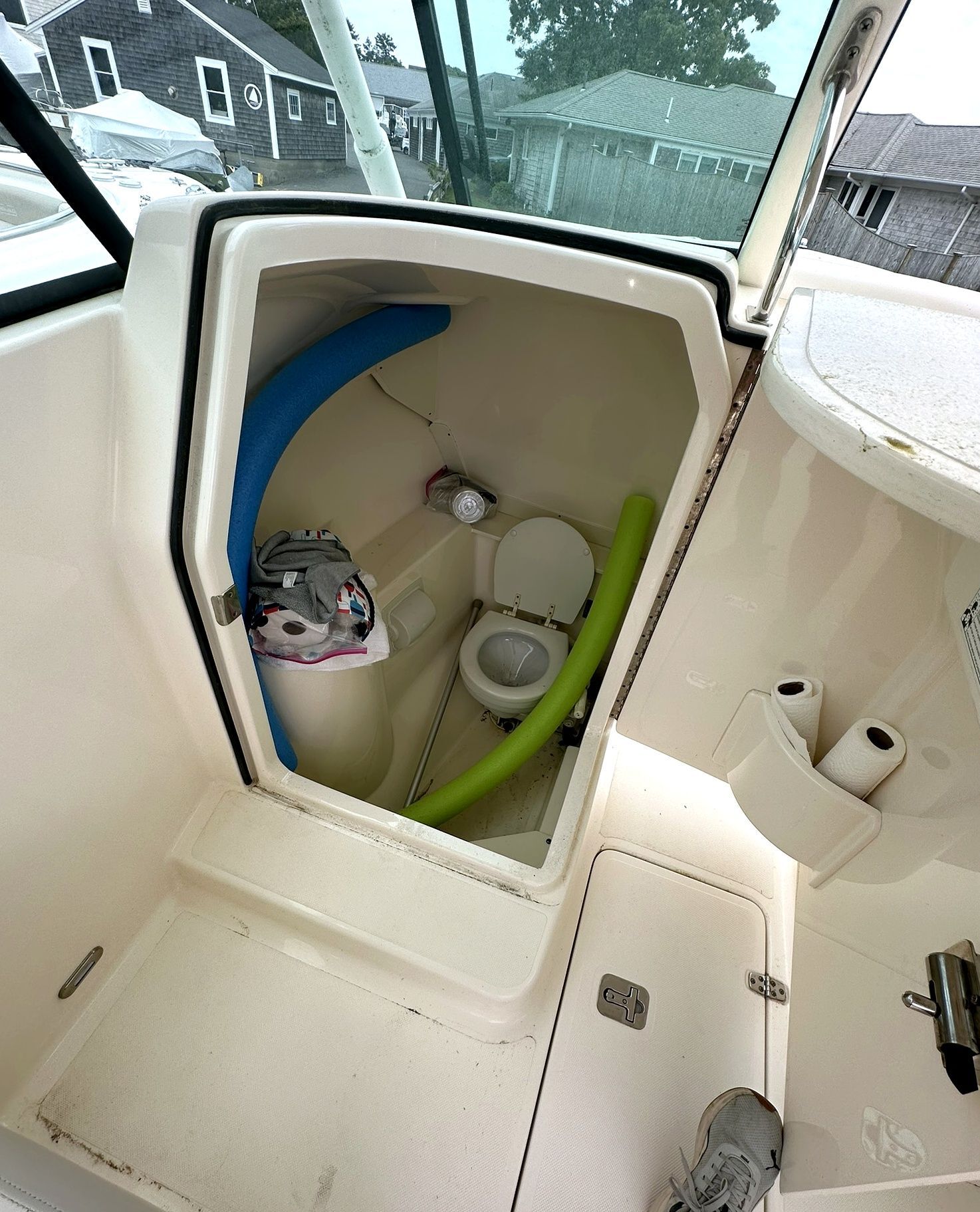 Bathroom on a 2012 Pursuit DC 265 Dual Console boat.