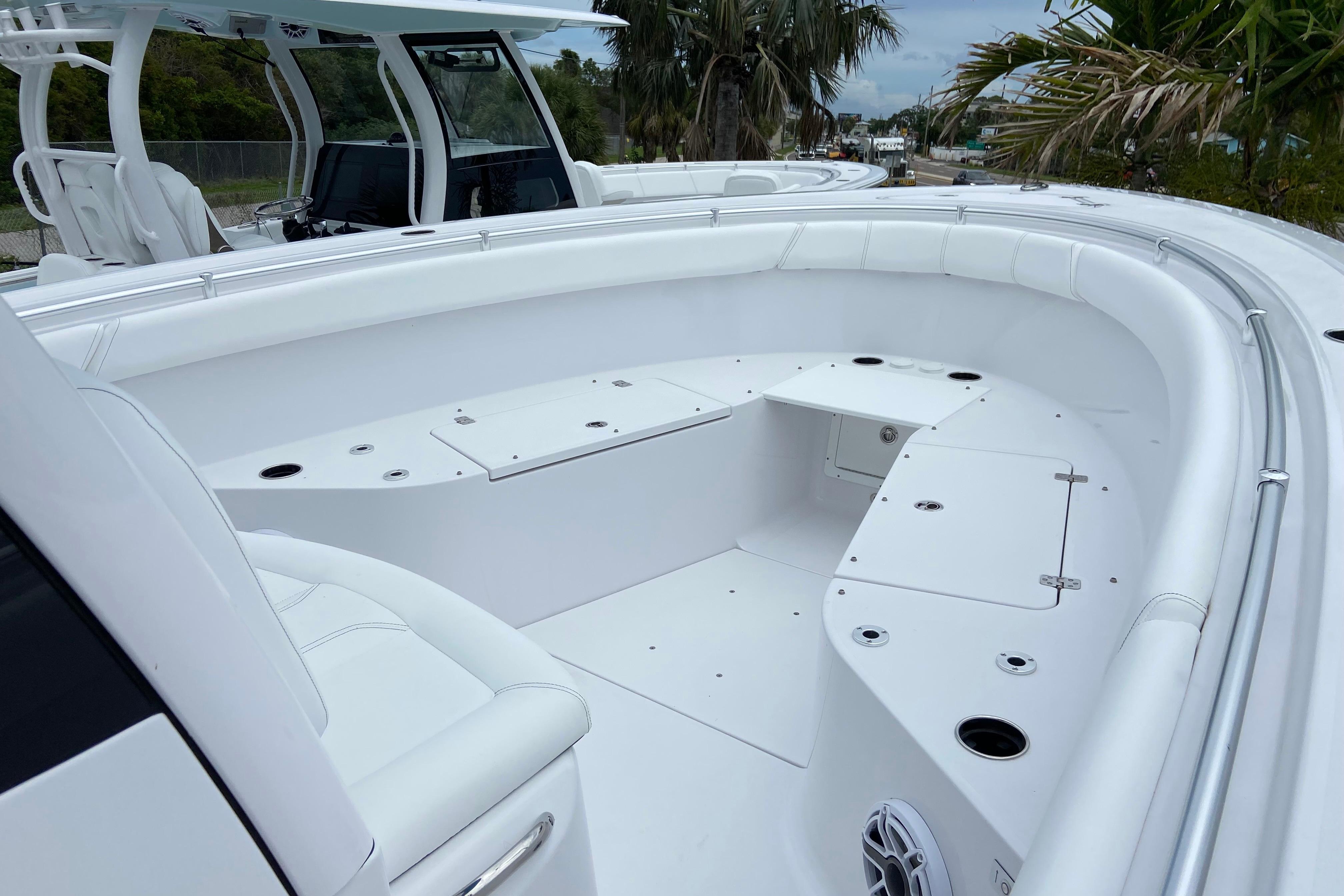 2026 Sportsman Open 302 Center Console boat with spacious seating and storage compartments.