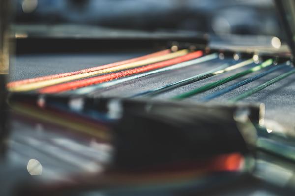 Close-up of colorful strings on Vision 444 model, 2025.