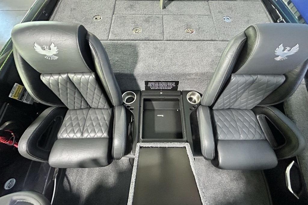 Luxury seating in 2026 Phoenix 819 ZXL boat with quilted leather and cup holders.