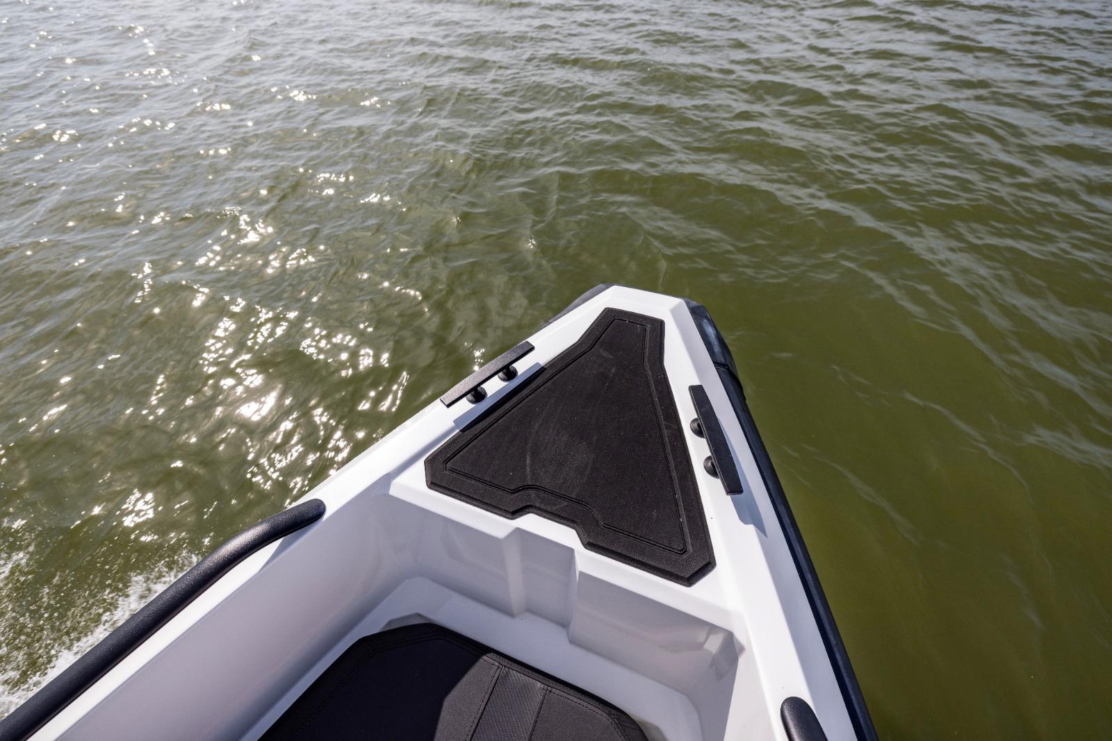 Bow of Iron 707 boat on water, 2022 model.