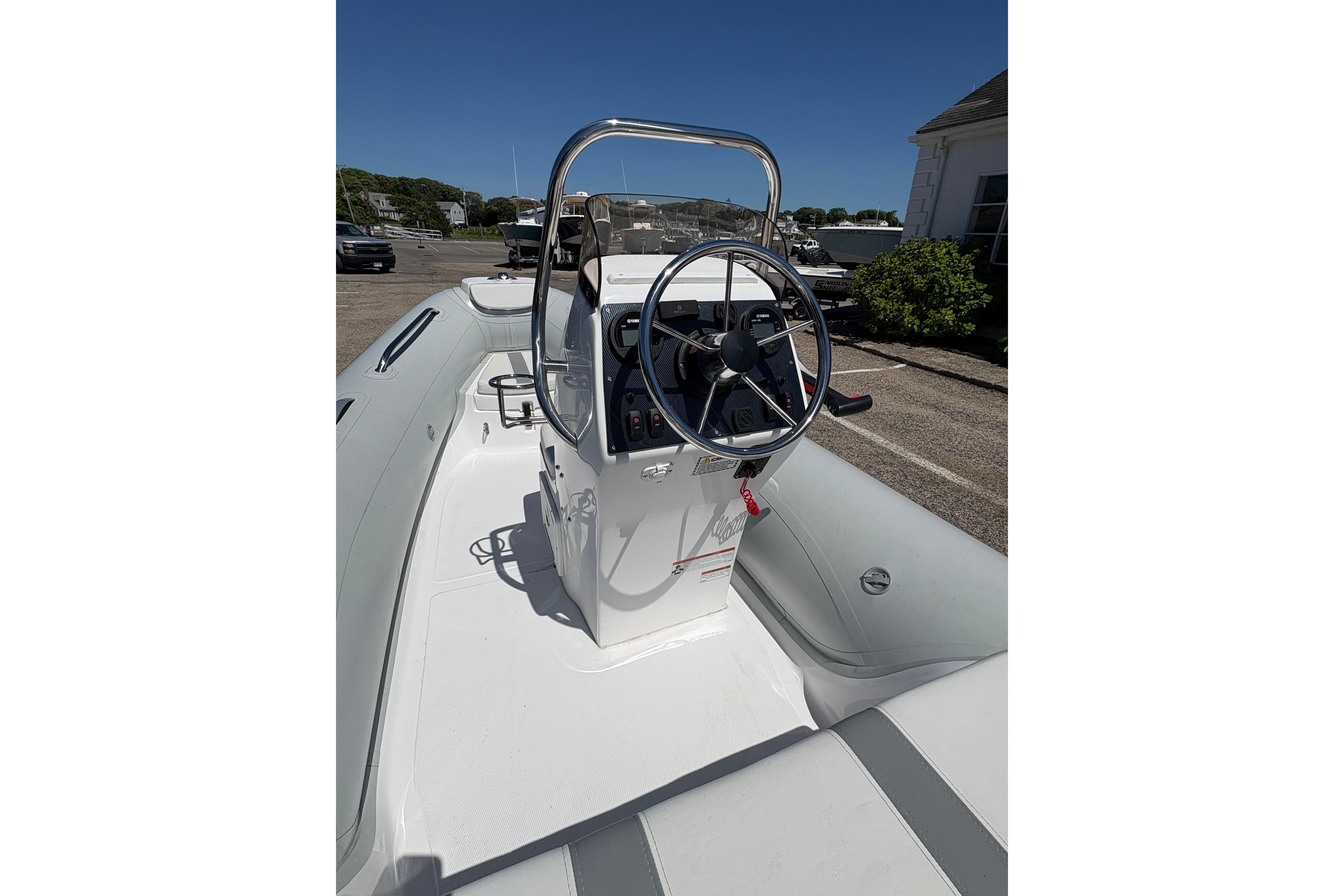 2022 AB Inflatables Oceanus 14 VST boat, featuring a sleek steering console.