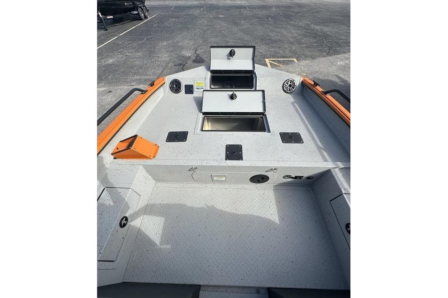 2026 SeaArk ProCat 240 boat deck with storage compartments and speakers.