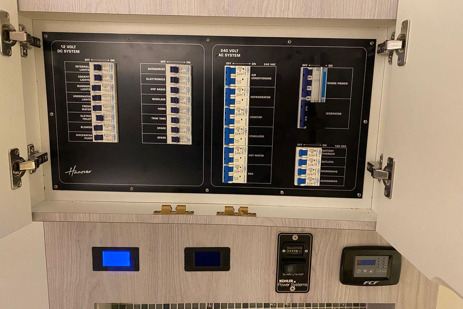 Electrical panel of a 2026 Hanover 375, featuring 12V DC and 240V AC systems.