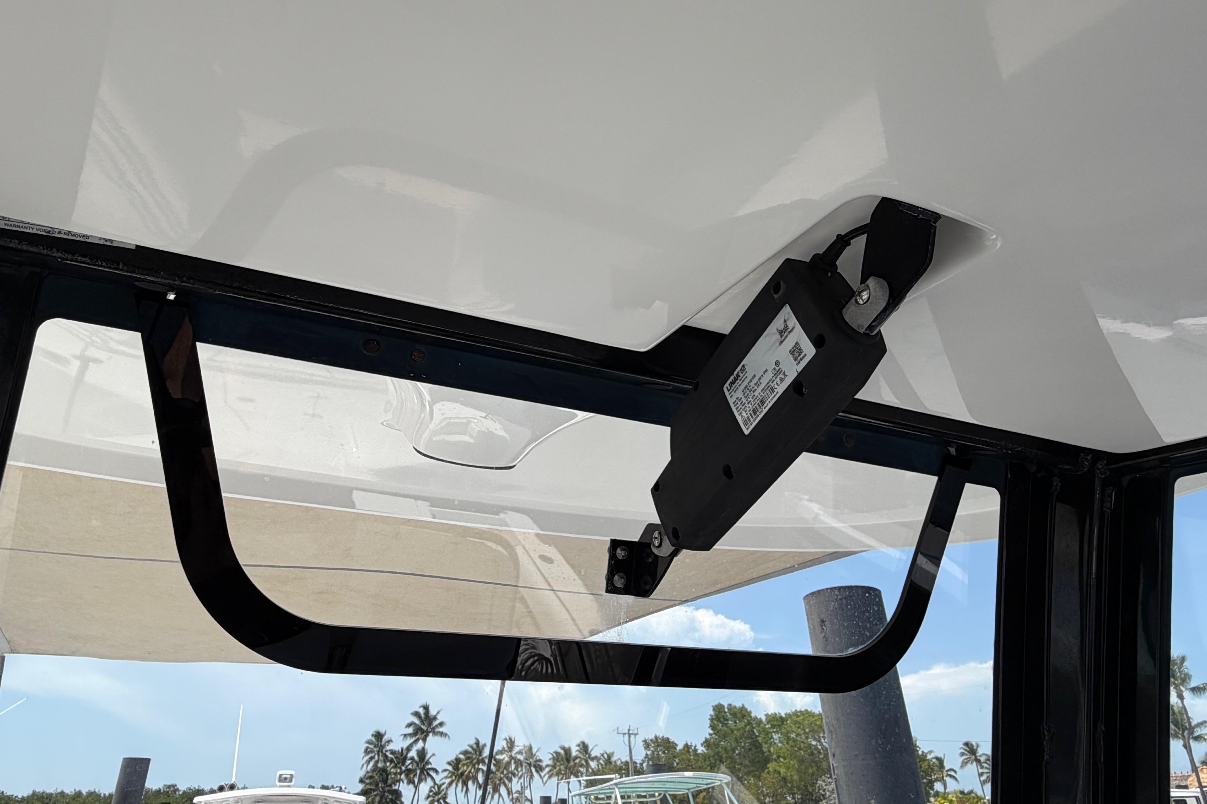 2019 Sea Hunt Gamefish 27 Coffin Box boat interior detail with hatch mechanism.