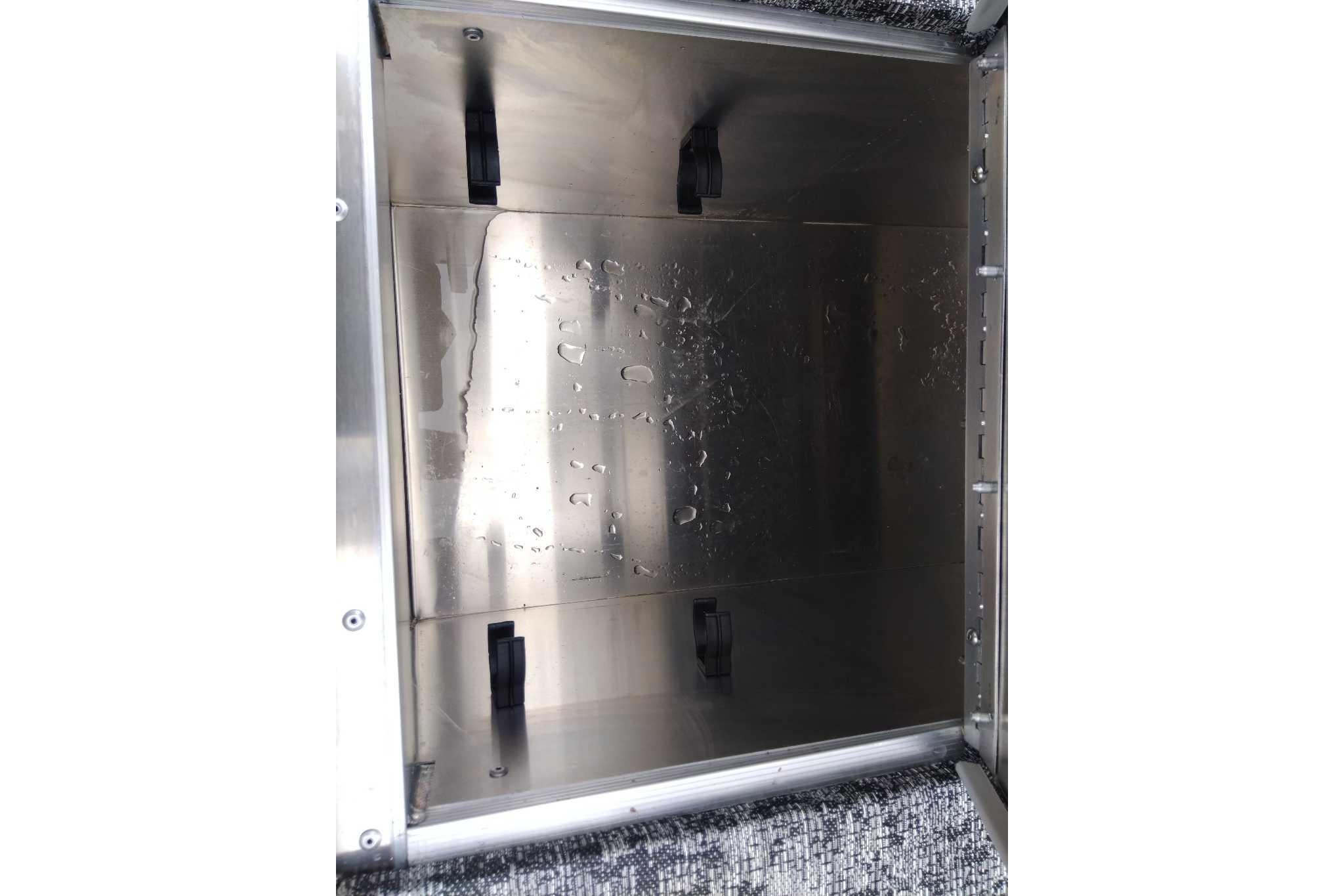 Interior view of 2026 Tracker Pro 170 boat compartment with water droplets.