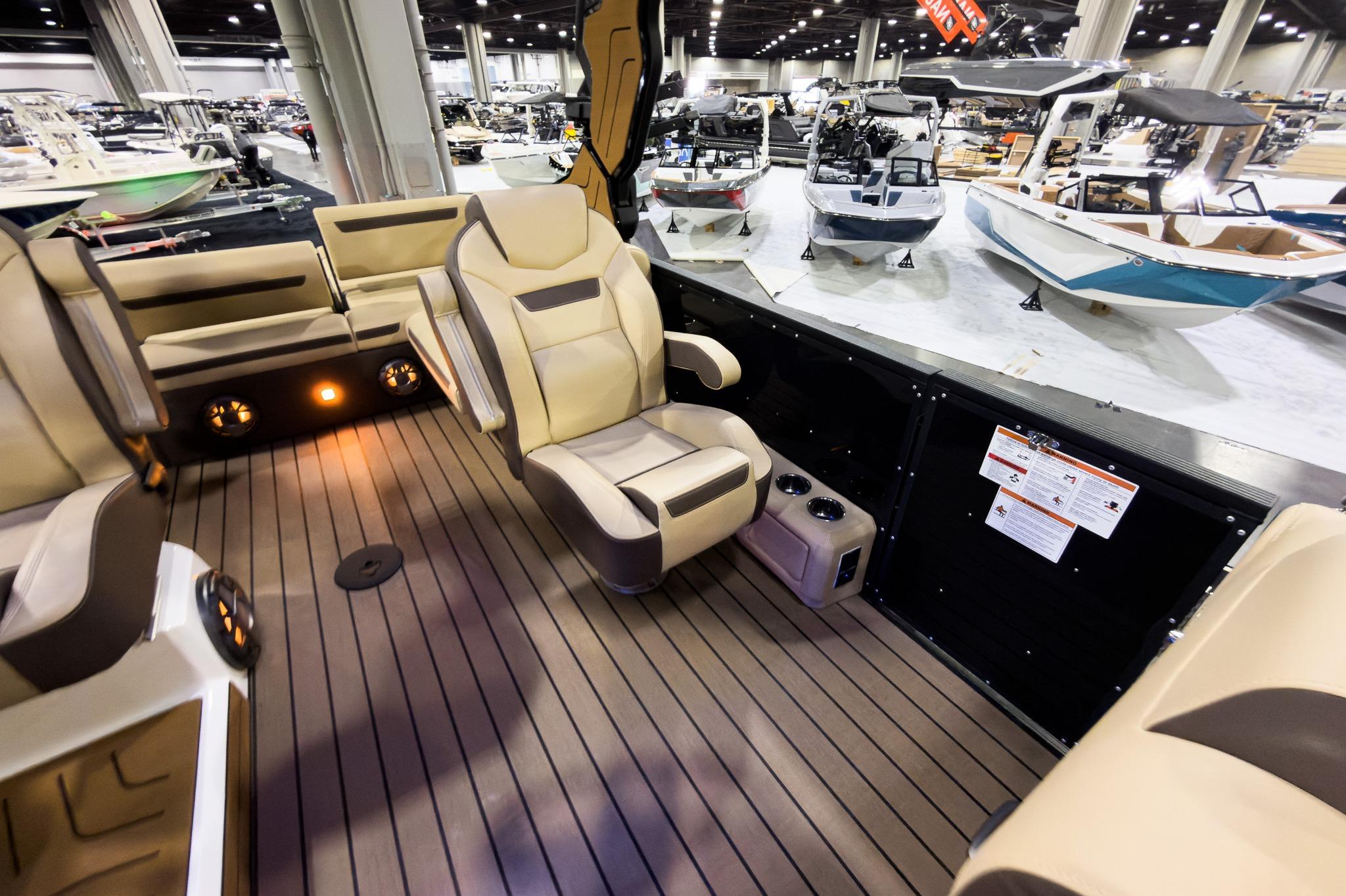 Luxurious interior of 2026 Montara Surf Boss EVO boat at a showroom display.