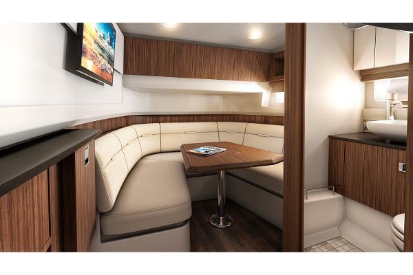 Manufacturer Provided Image: Interior of 2018 Sea Ray SLX 400 yacht with modern seating and dining area.