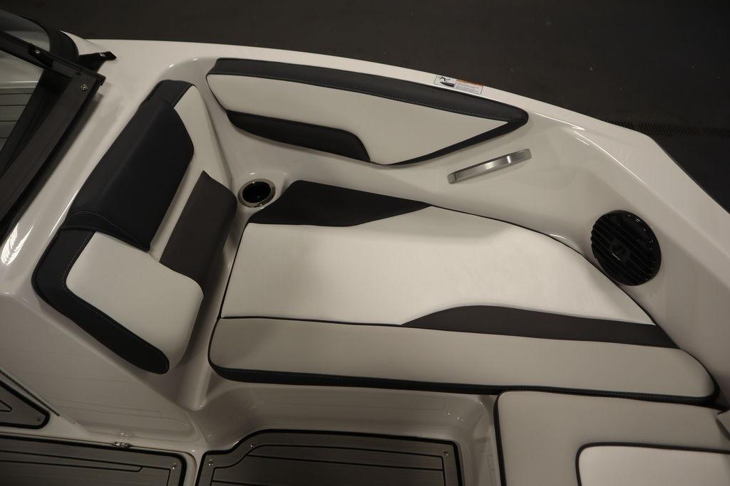Interior seating of 2026 Yamaha Boats 195S, featuring sleek black and white upholstery.