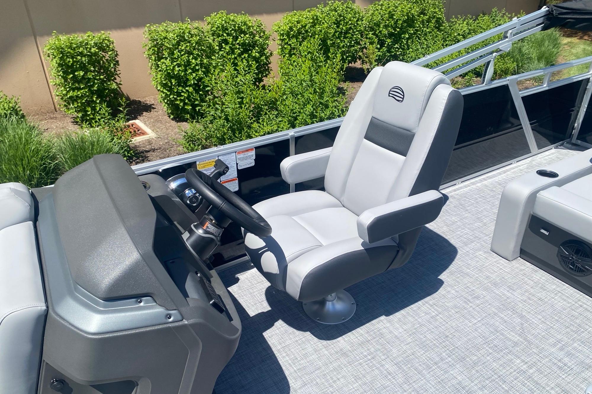 Captain's chair on 2026 Sun Tracker Party Barge 22 RF DLX pontoon boat.