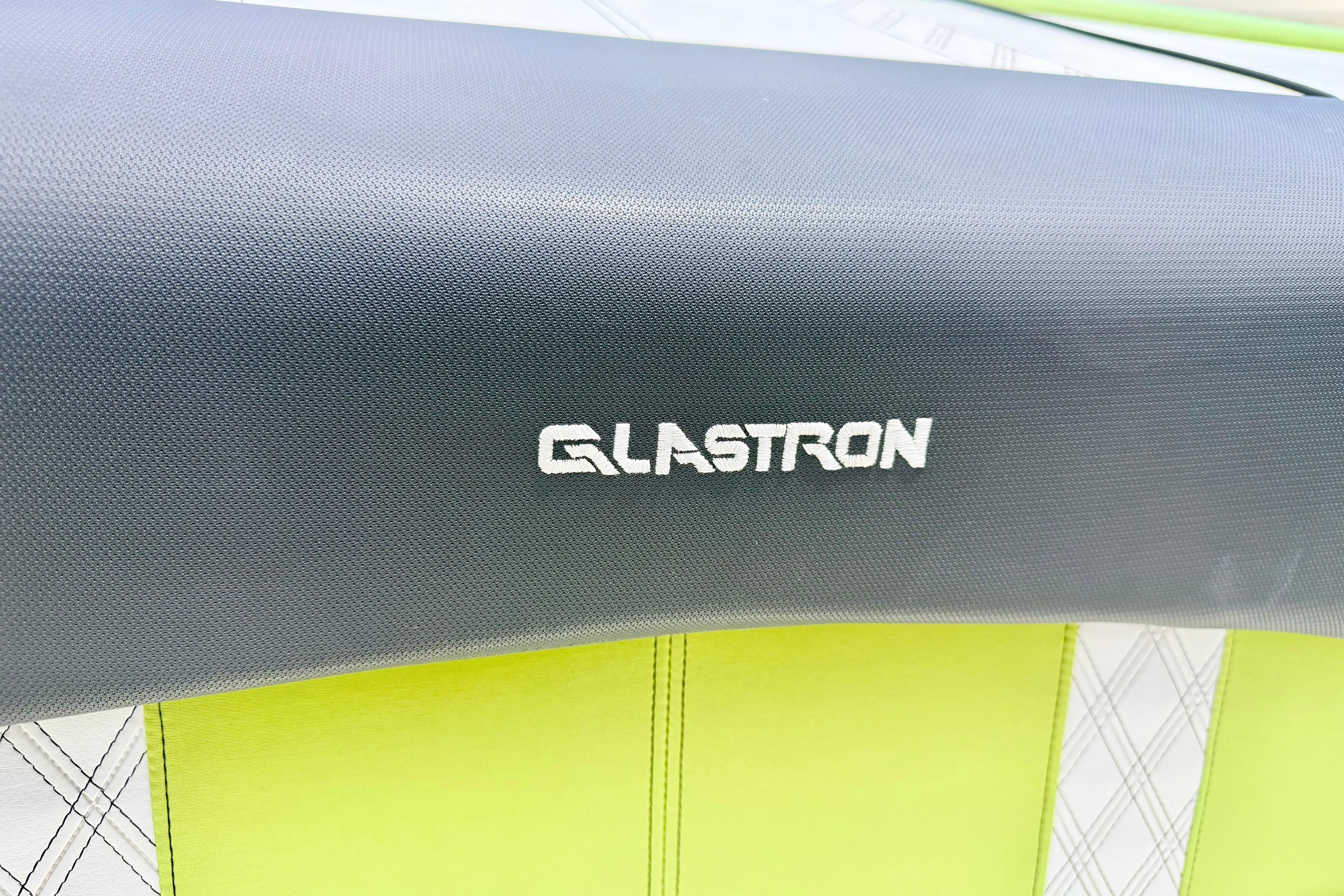Glastron GT 185 2018 boat seat with logo, featuring green and white upholstery.