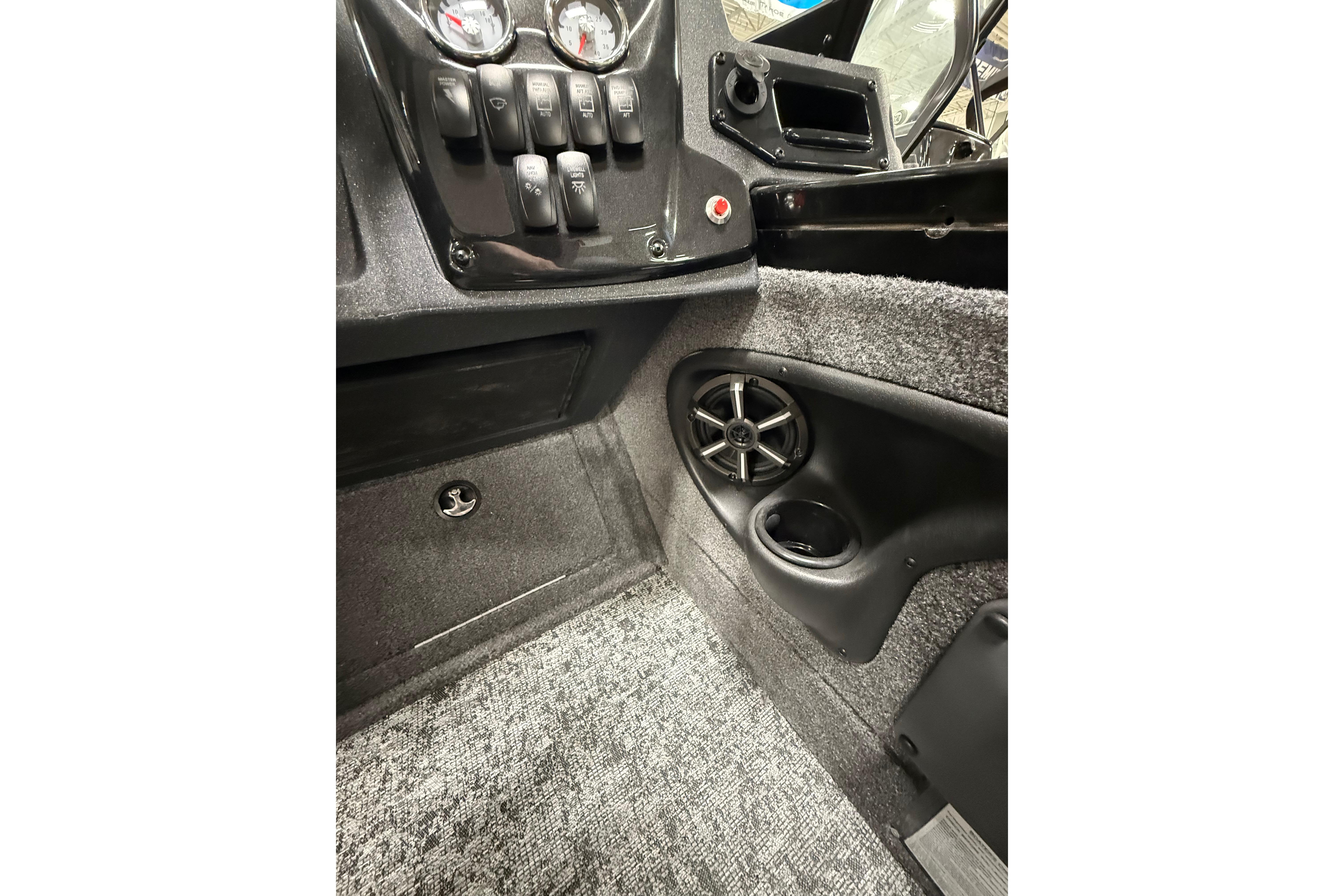 Interior view of 2026 Tracker Targa V-19 WT boat dashboard and speaker system.