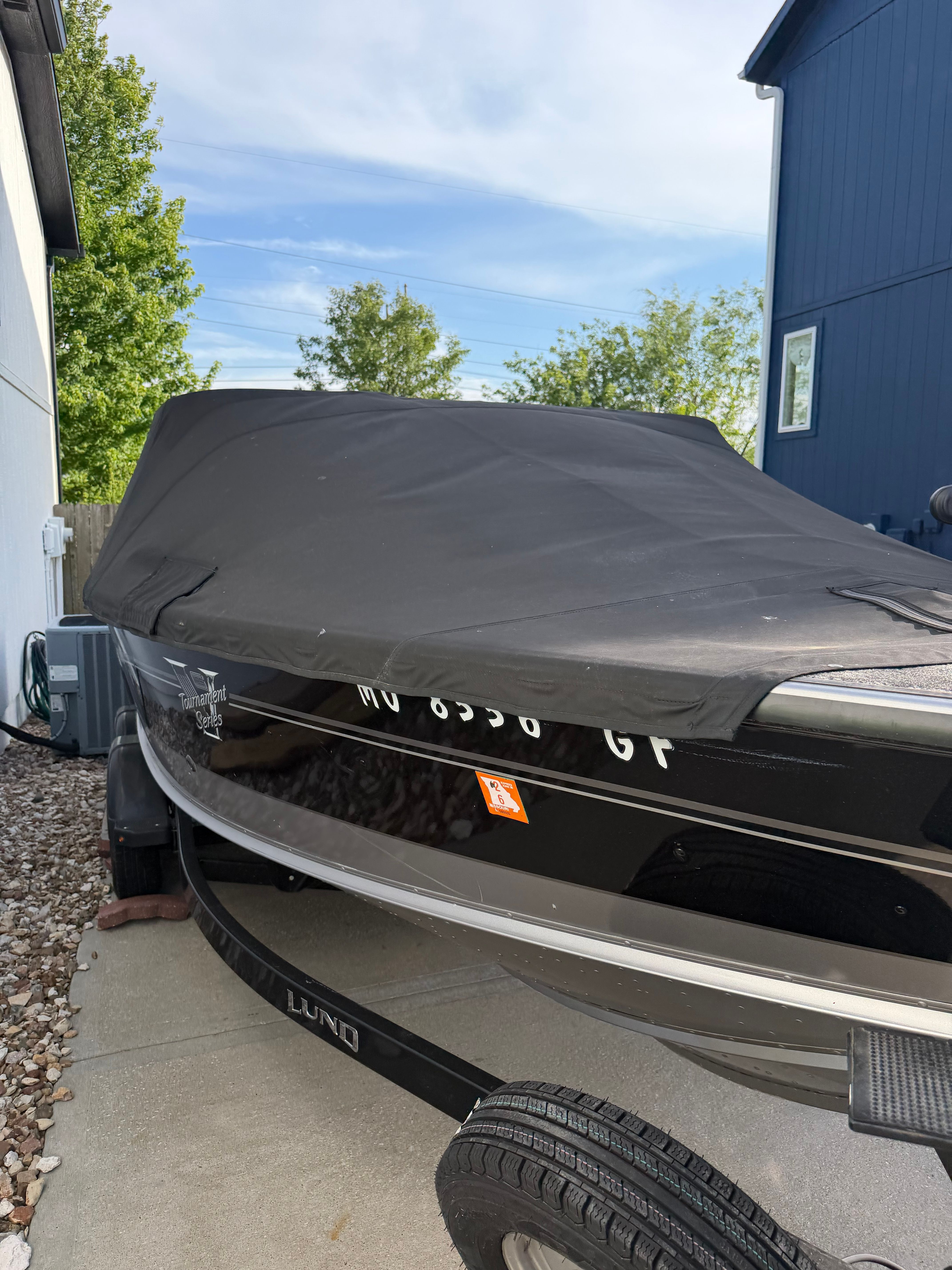 2017 Lund Pro V 1975 boat with cover on trailer.