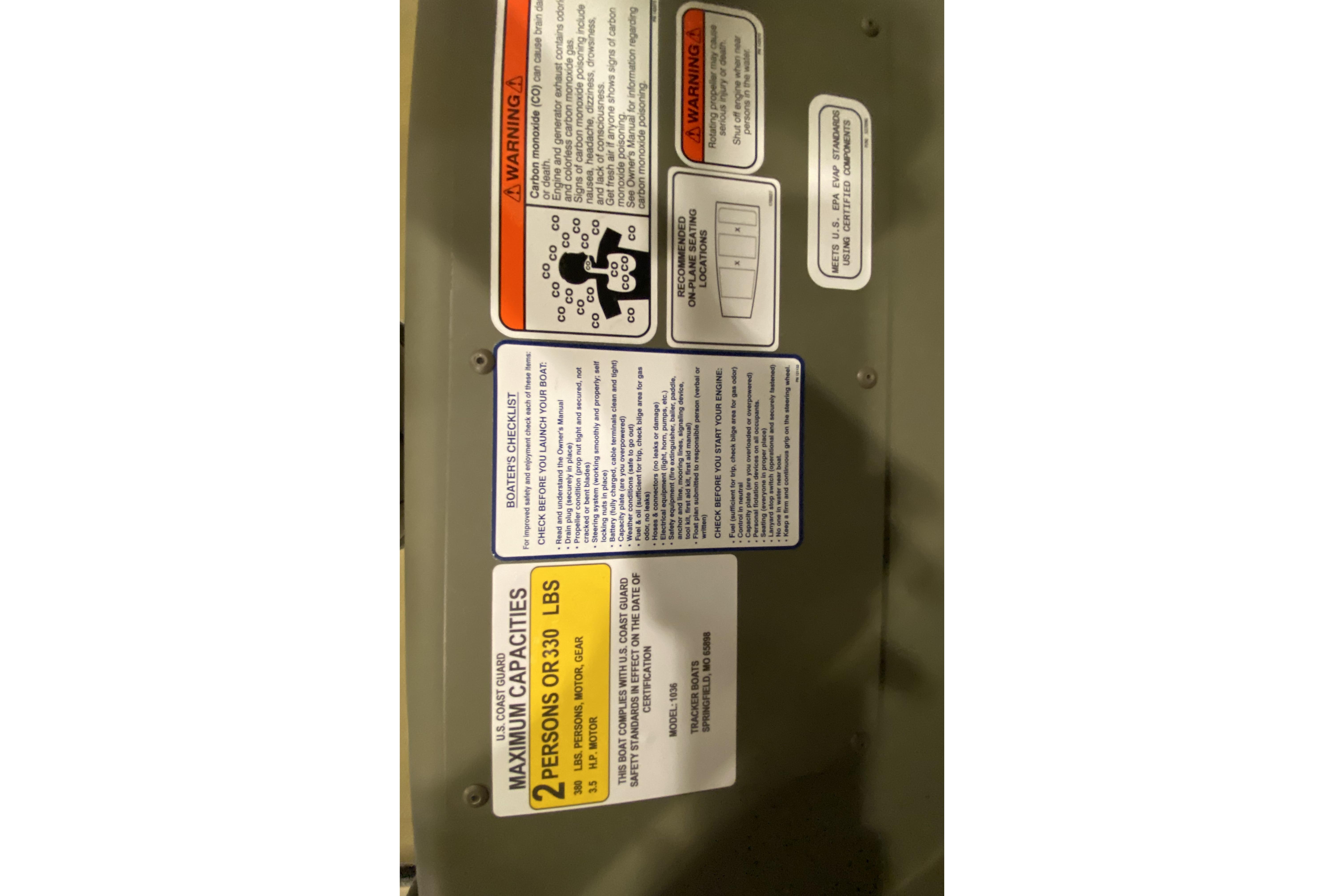 2026 Tracker Grizzly 10 Jon boat capacity and safety warning labels.