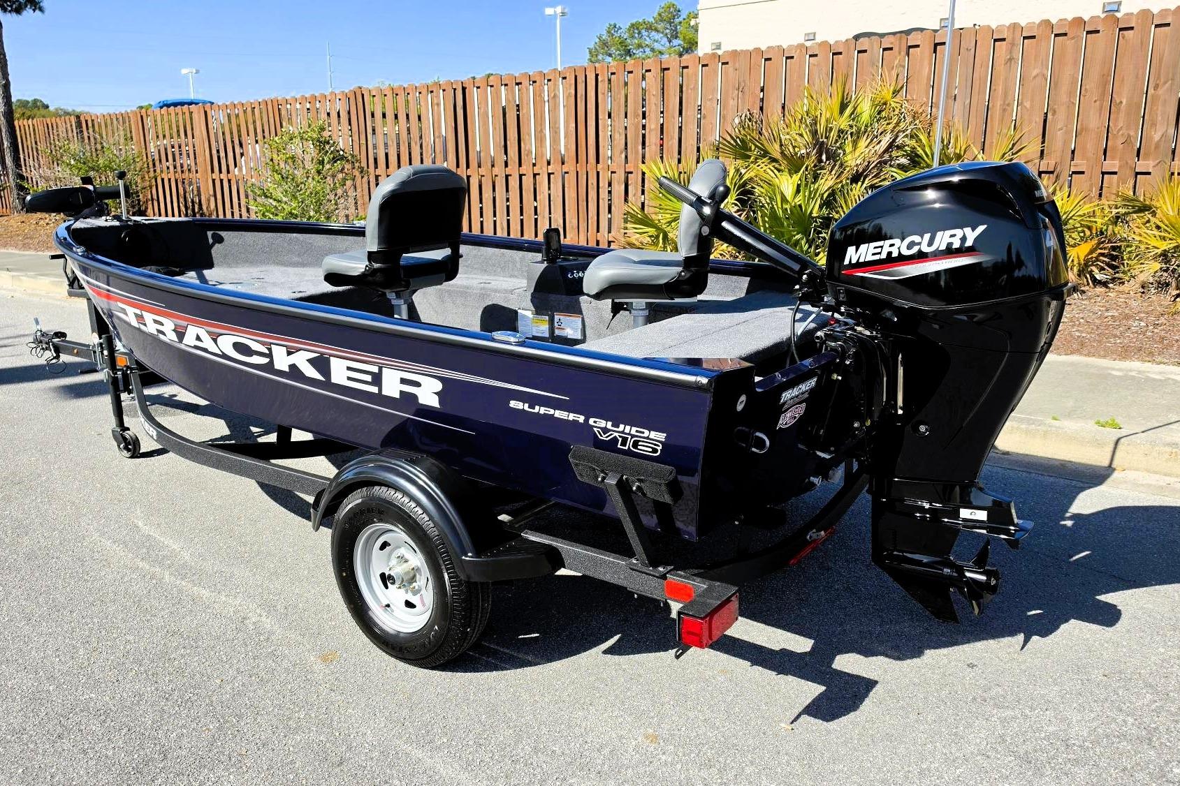 2026 Tracker Super Guide V-16 T boat with Mercury outboard motor on trailer.