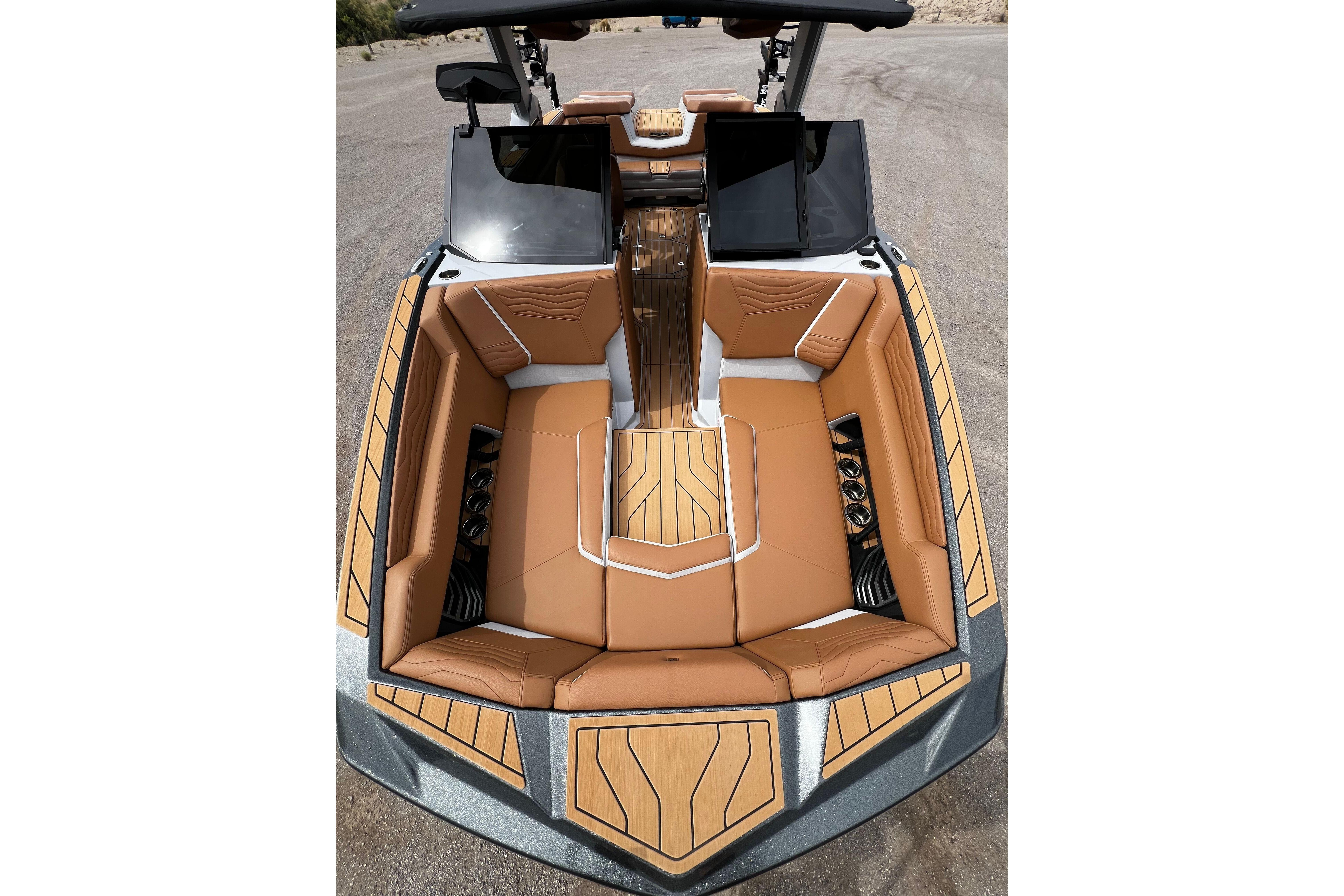 2026 Nautique Super Air Nautique G25 boat interior with tan seating and sleek design.