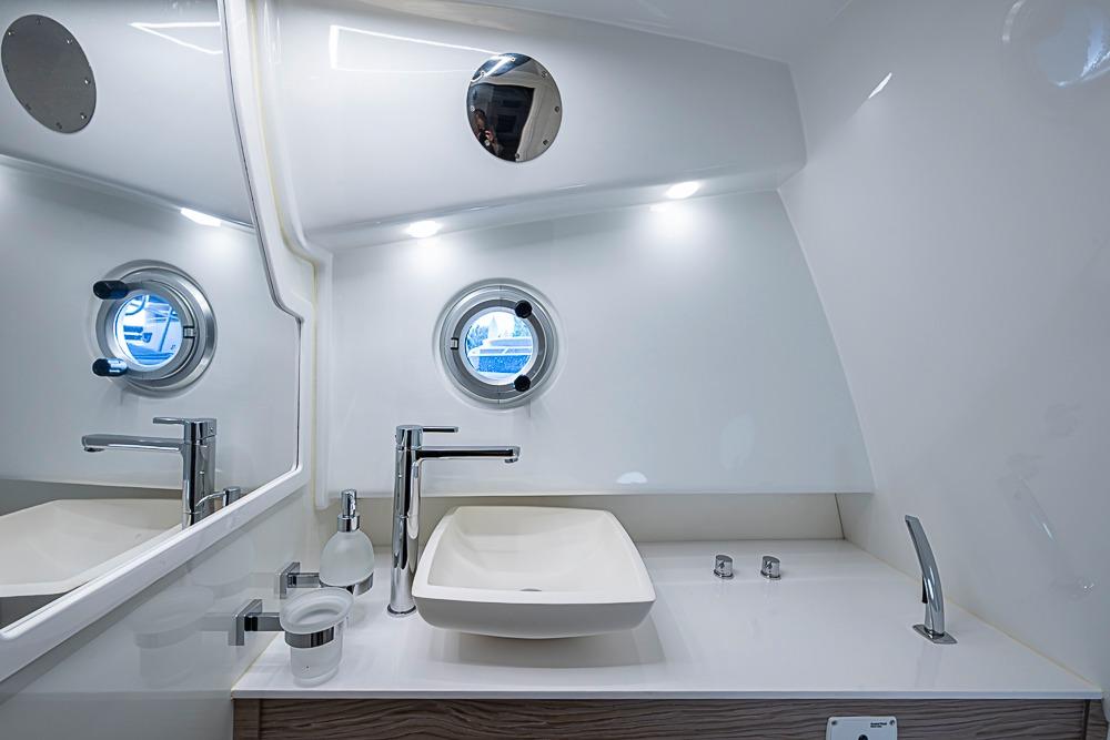 Luxurious bathroom interior of 2025 SACS Strider 11 yacht with modern fixtures.