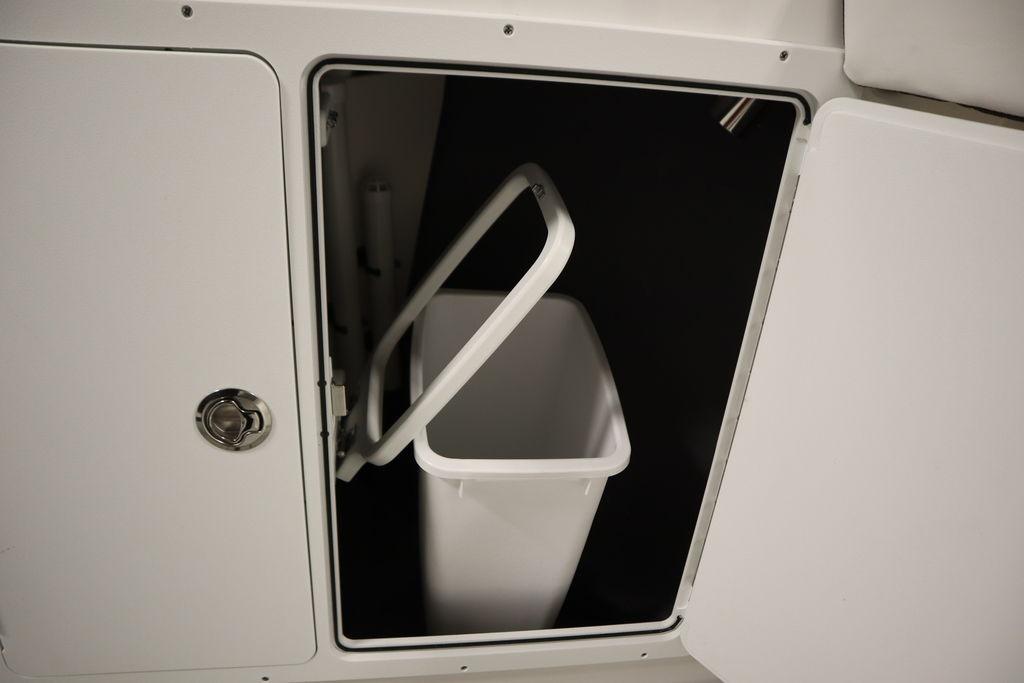 Storage compartment with trash bin on 2026 Yamaha Boats 255 FSH Sport E.