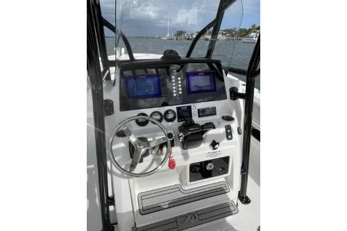 2023 Sea Fox 268 Commander boat dashboard with dual screens and steering wheel.