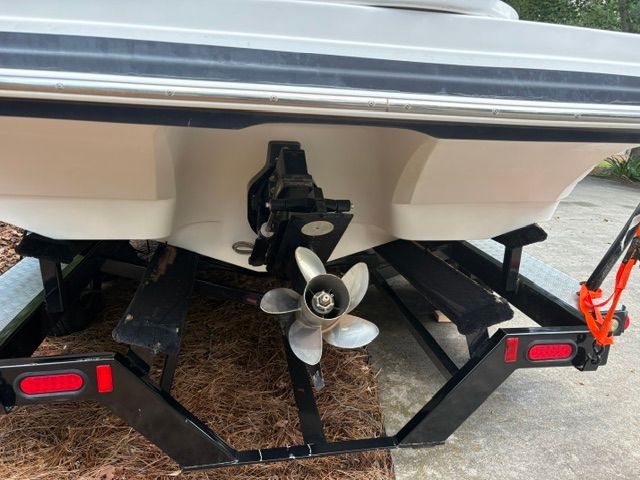 The image shows the stern of a 2007 Rinker 226 Captiva Bowrider on a trailer.