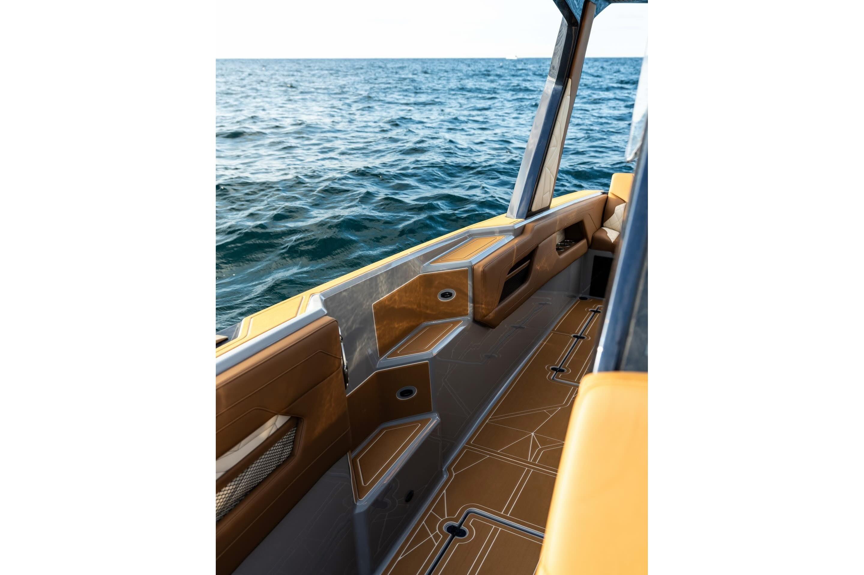 Modern AMP 34S boat interior with sleek design, overlooking the ocean, 2027 model.