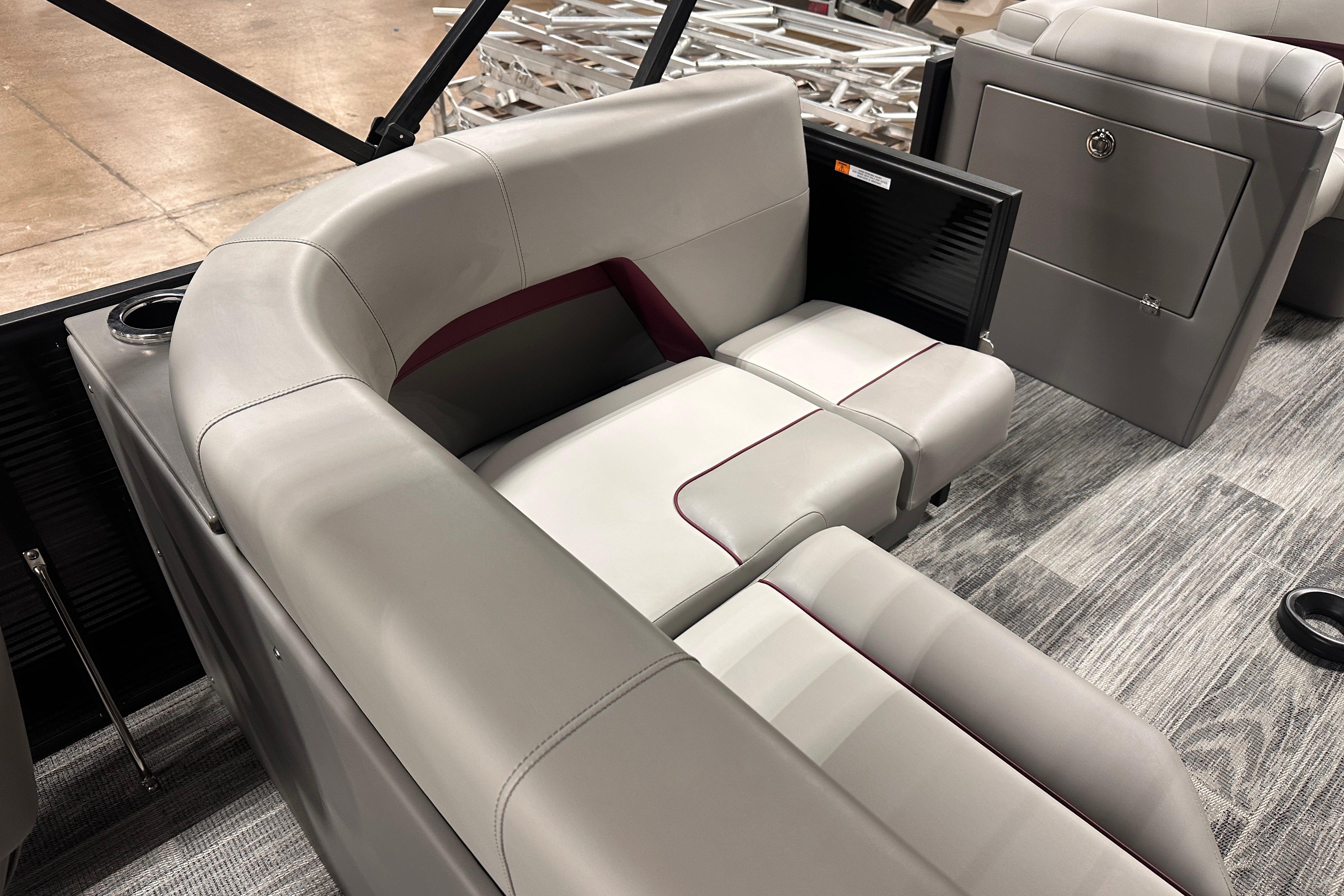 2025 Qwest 18 XRE Cruise boat interior with modern seating and sleek design.