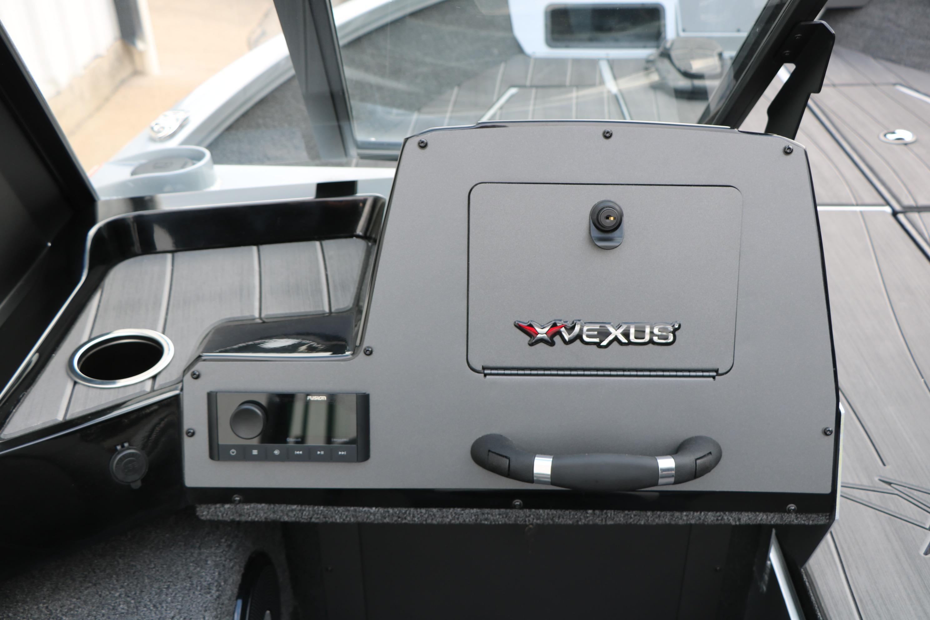 2026 Vexus ADX 190 boat console with control panel and cup holder.
