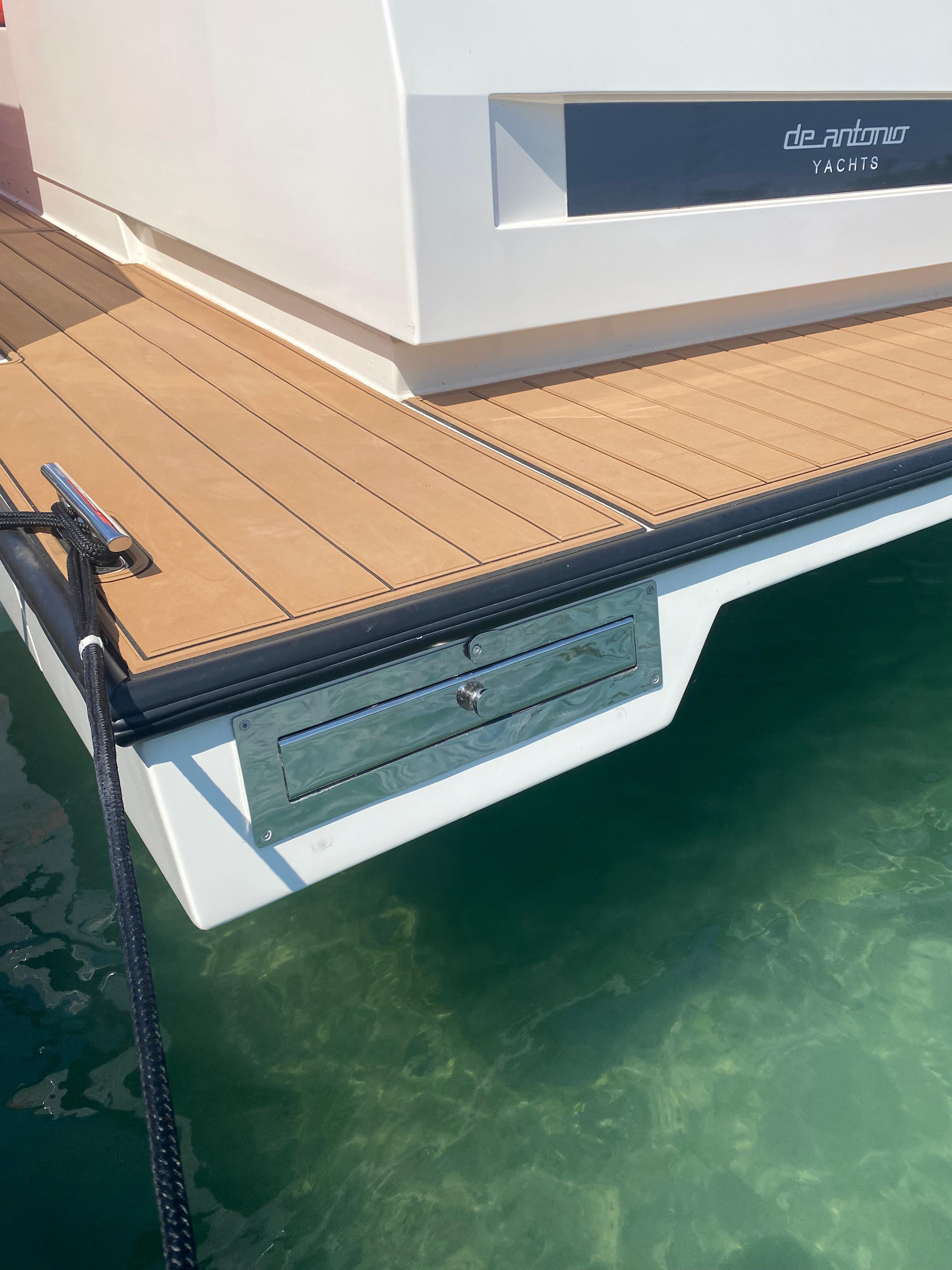 De Antonio Yachts D 28 2020 model, rear deck view with teak flooring.