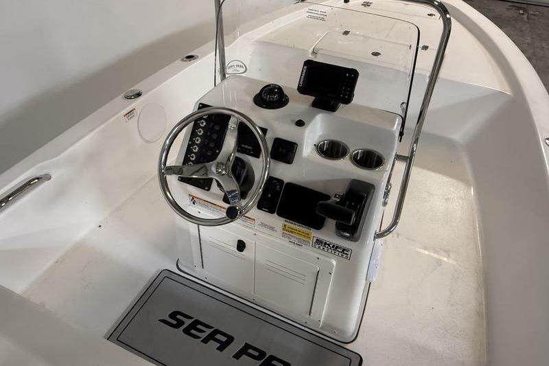 2026 Sea Pro 172 Bay boat console with steering wheel and controls.