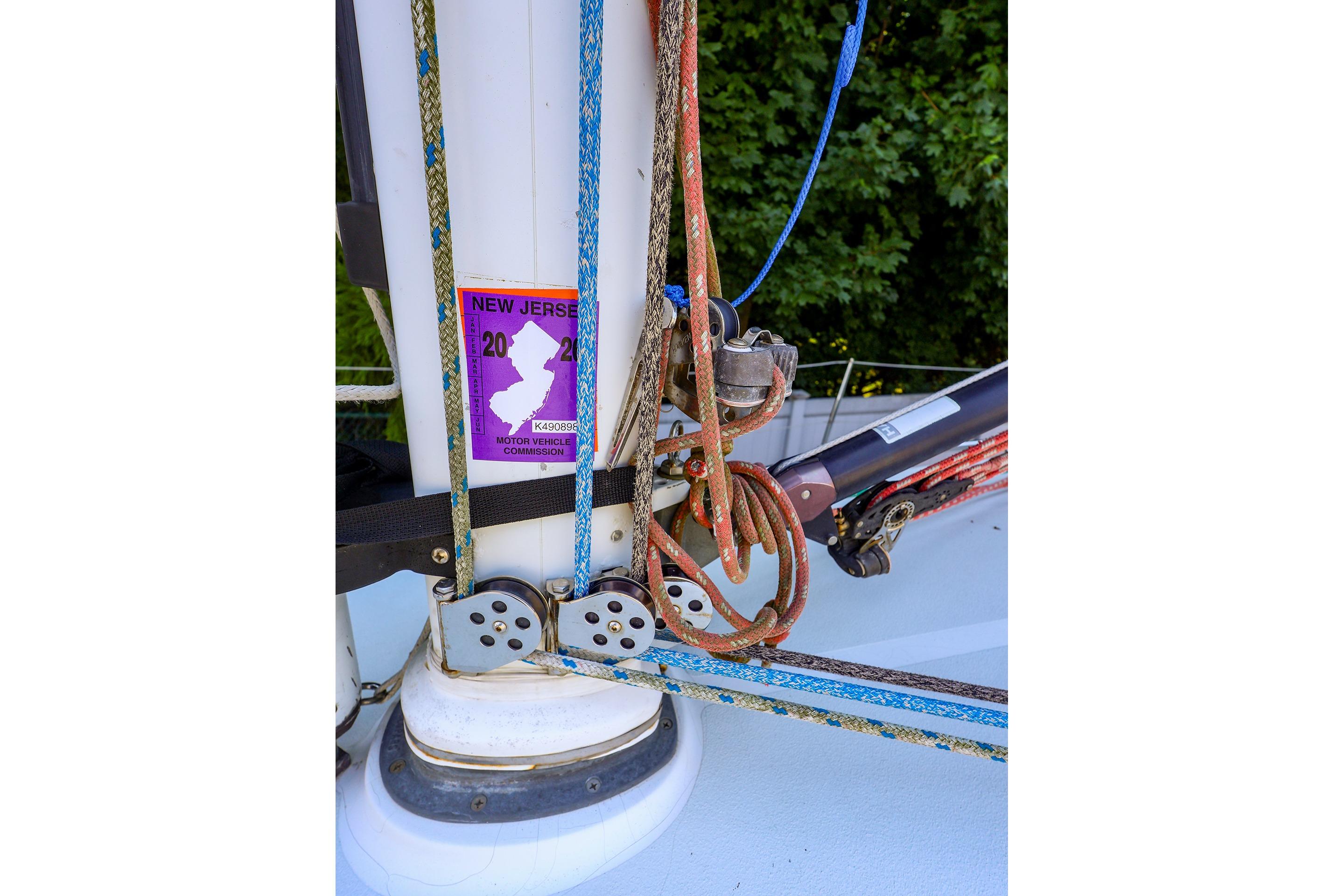 Sailing rigging on a 2001 J Boats J/32 with New Jersey registration sticker.