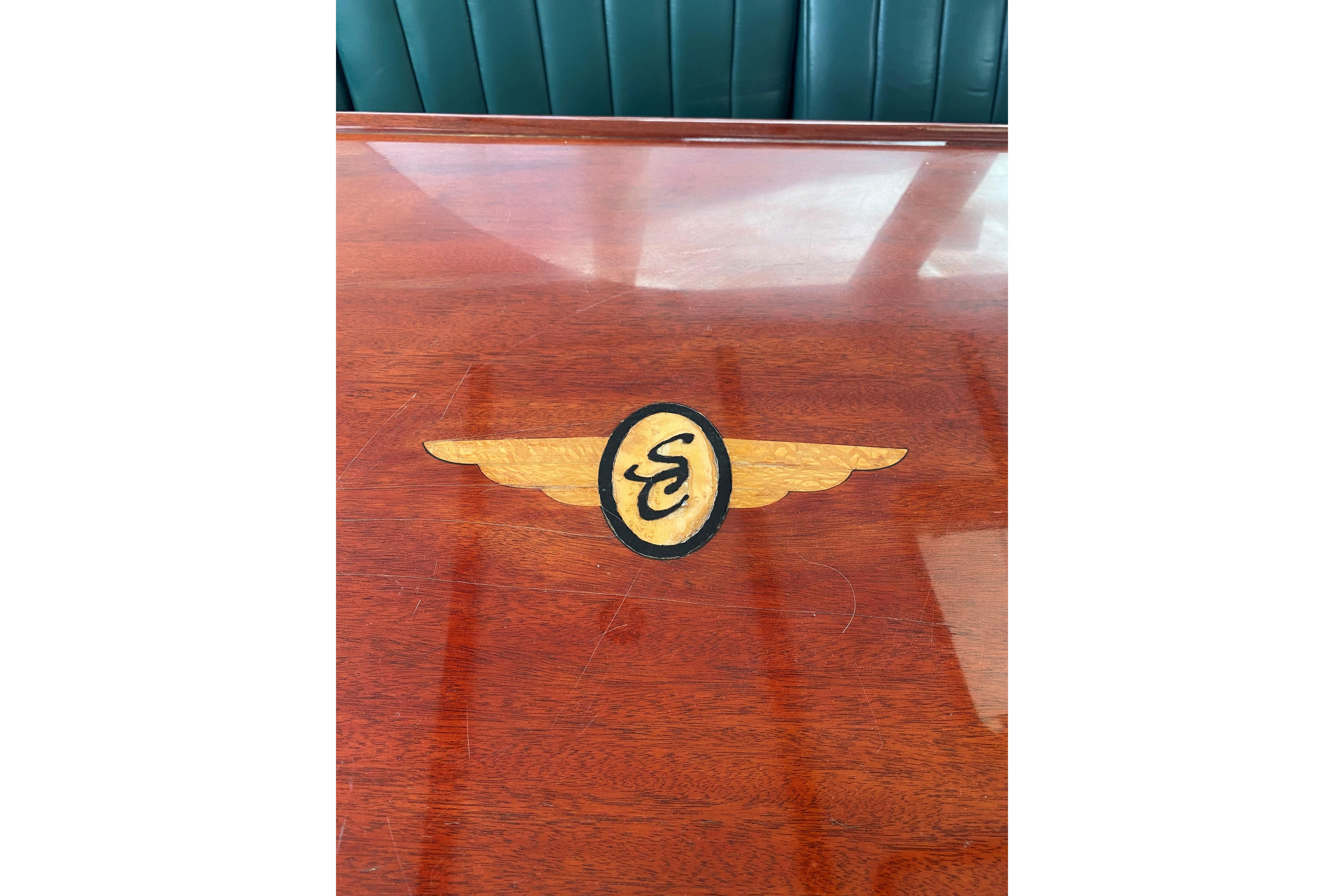 Mahogany Table with Santa Cruz Coastal Flyer engraved on bridge.