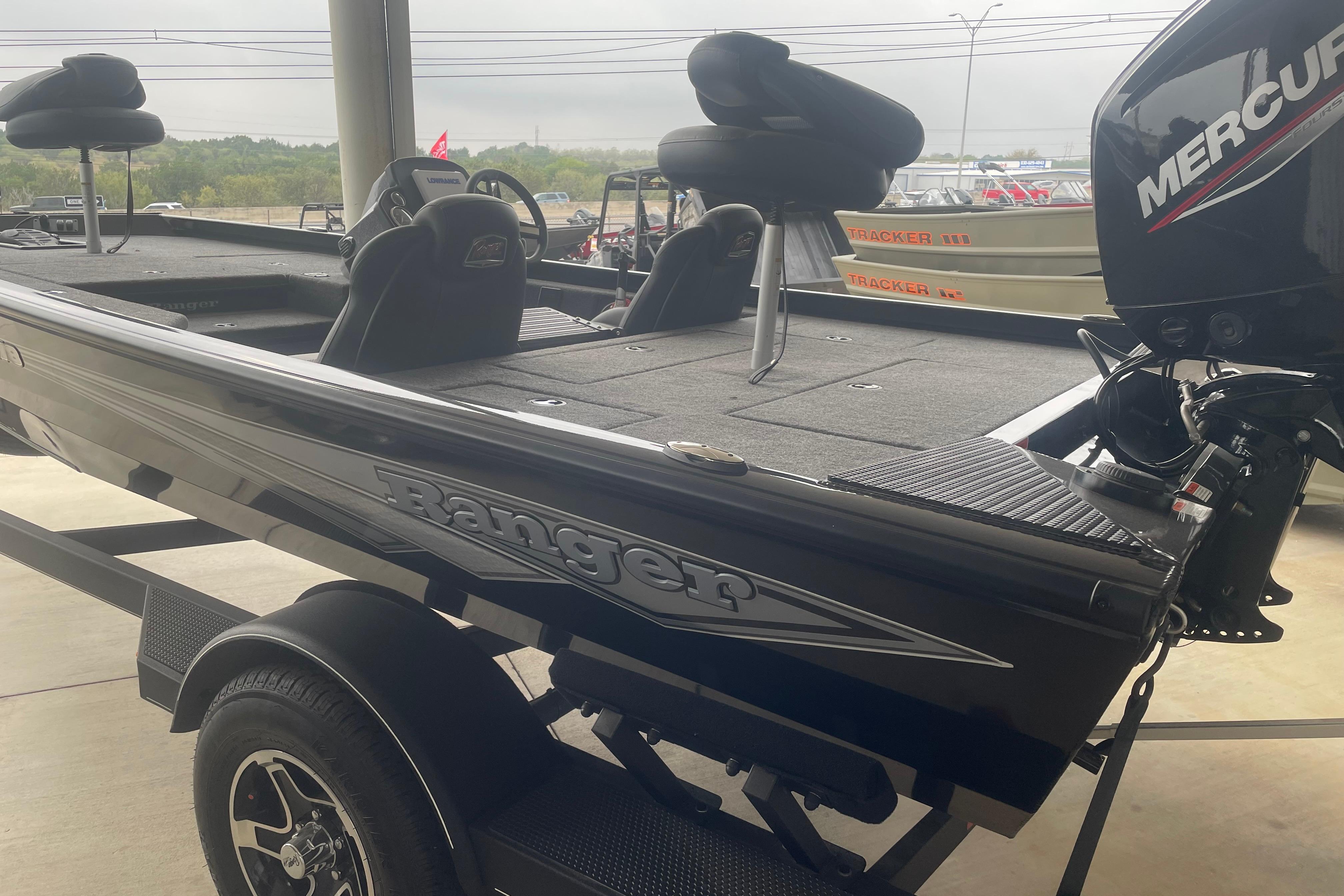 2026 Ranger RT178 boat with Mercury engine, parked on a trailer.