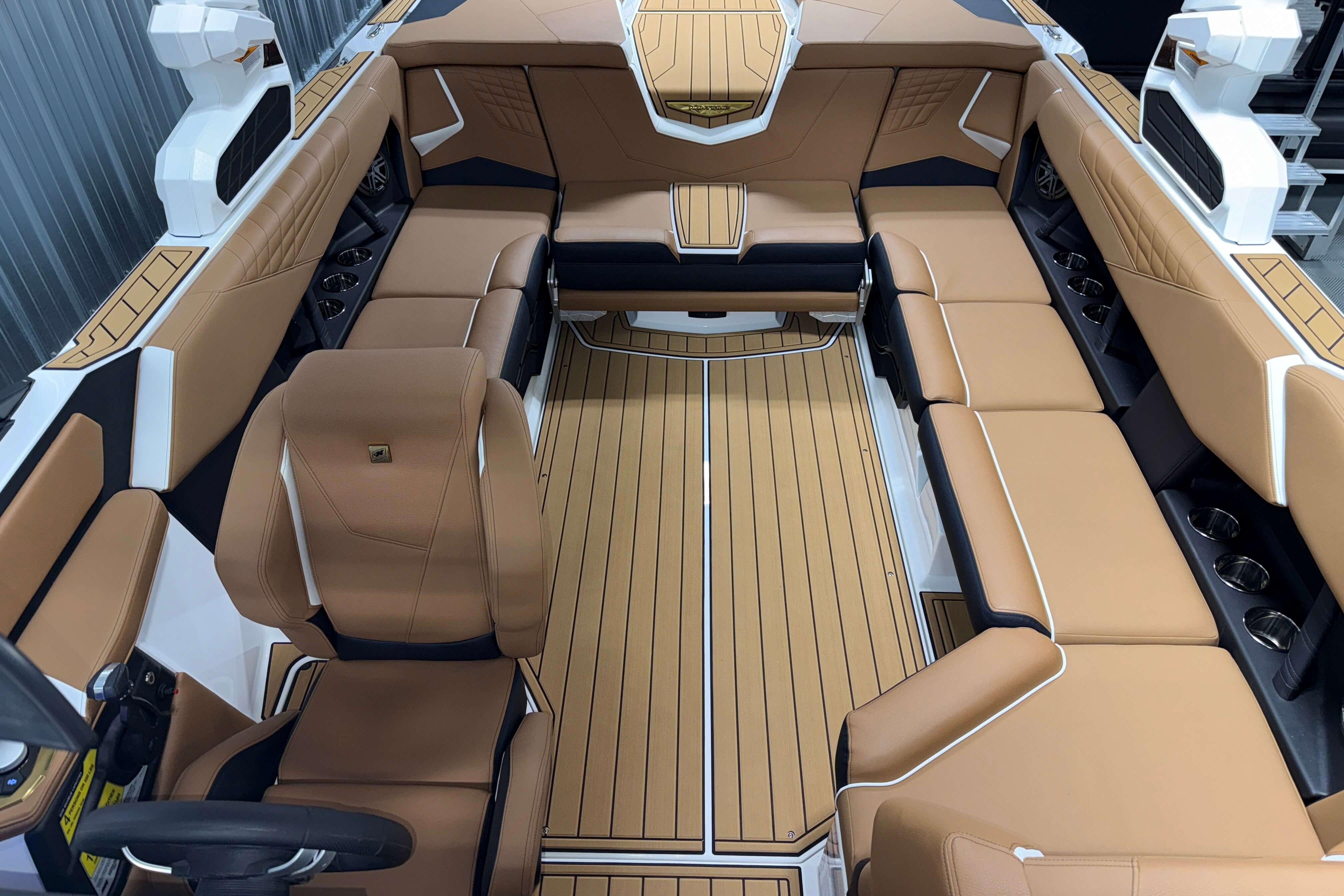 2026 Nautique Super Air Nautique S23 interior with tan leather seating and sleek design.