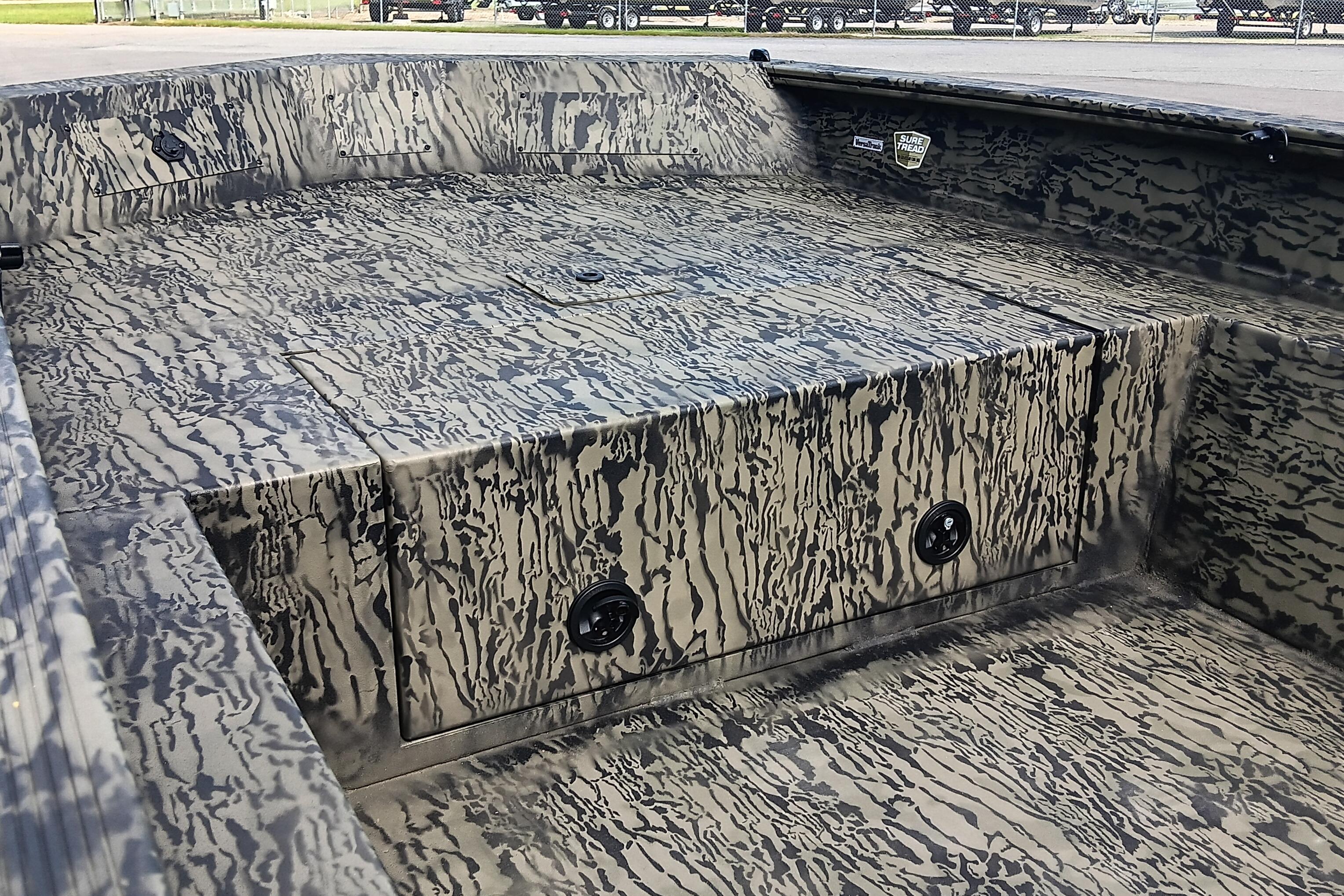 2026 Tracker Grizzly 1650 T Prairie Wings Edition boat interior with camouflage design.