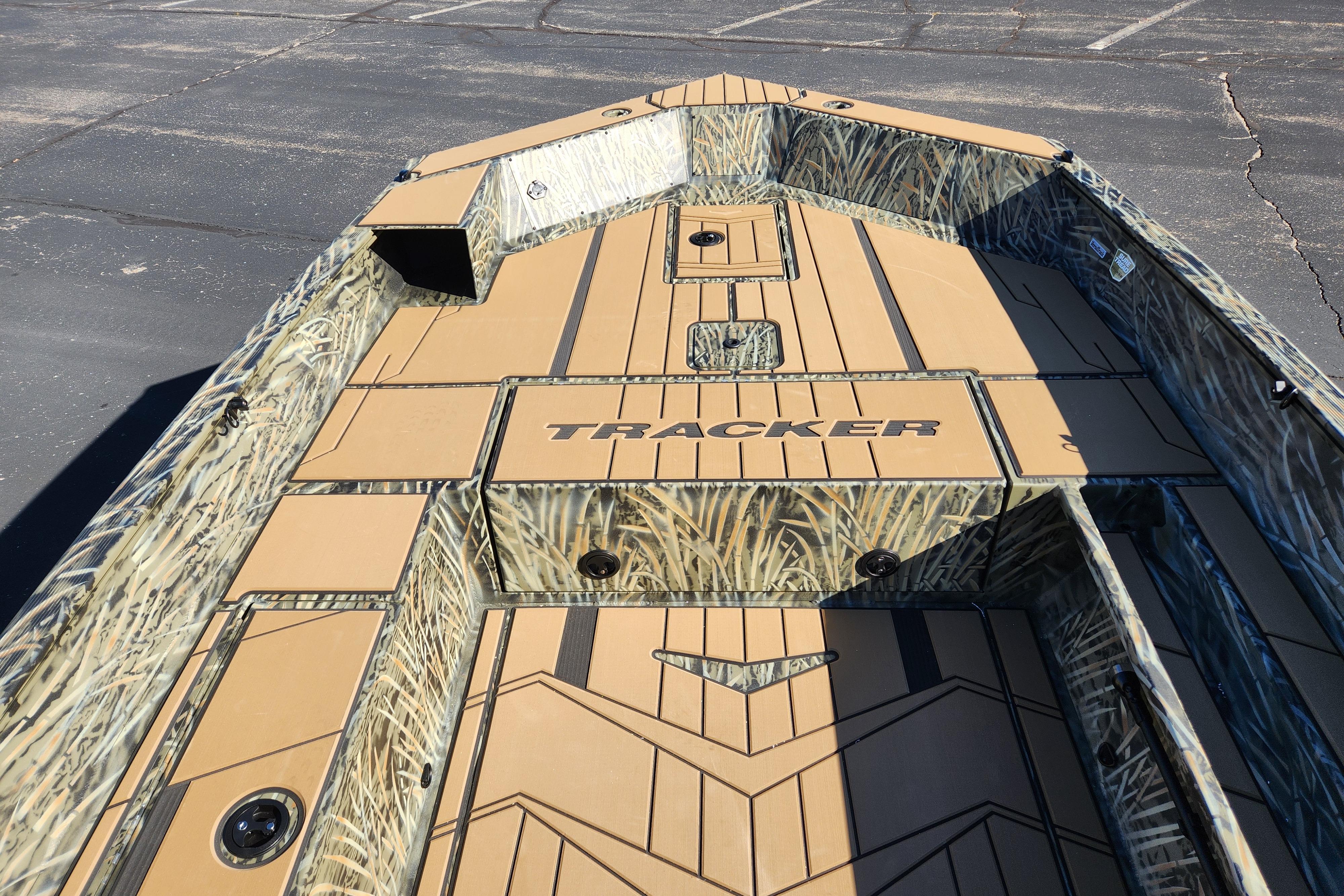 2026 Tracker Grizzly 1756 T Marsh boat with camouflage design on deck.