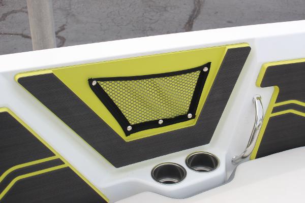 2023 Scarab 255 Open ID boat interior with cup holders and storage net.