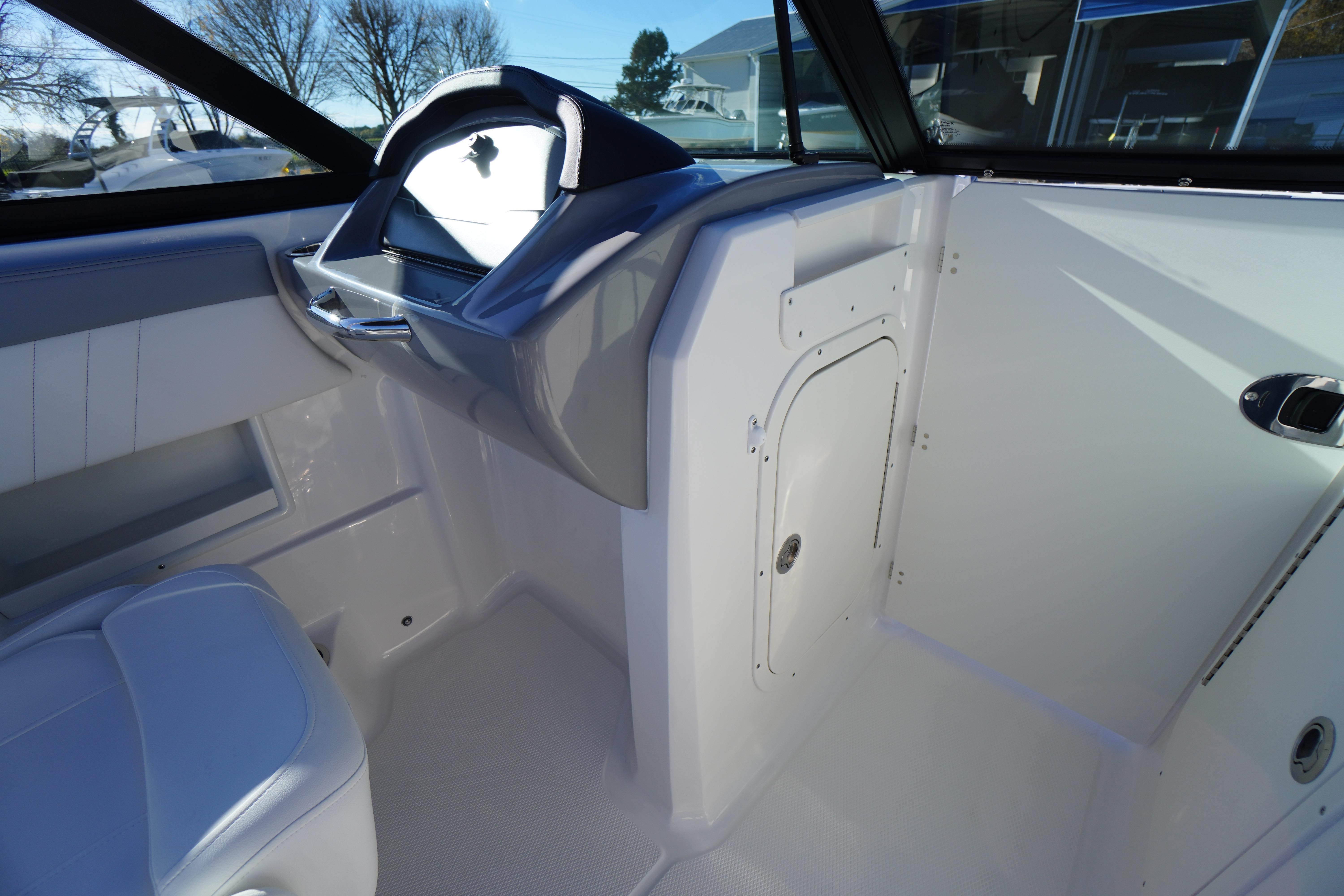 Interior of 2026 Chaparral 23 SSi boat, featuring sleek design and modern controls.