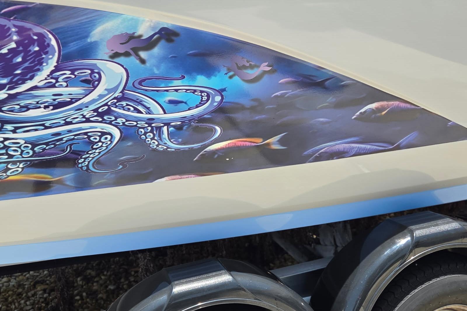 2024 Yamaha Boats 222 FSH Sport E with vibrant marine-themed artwork featuring an octopus.
